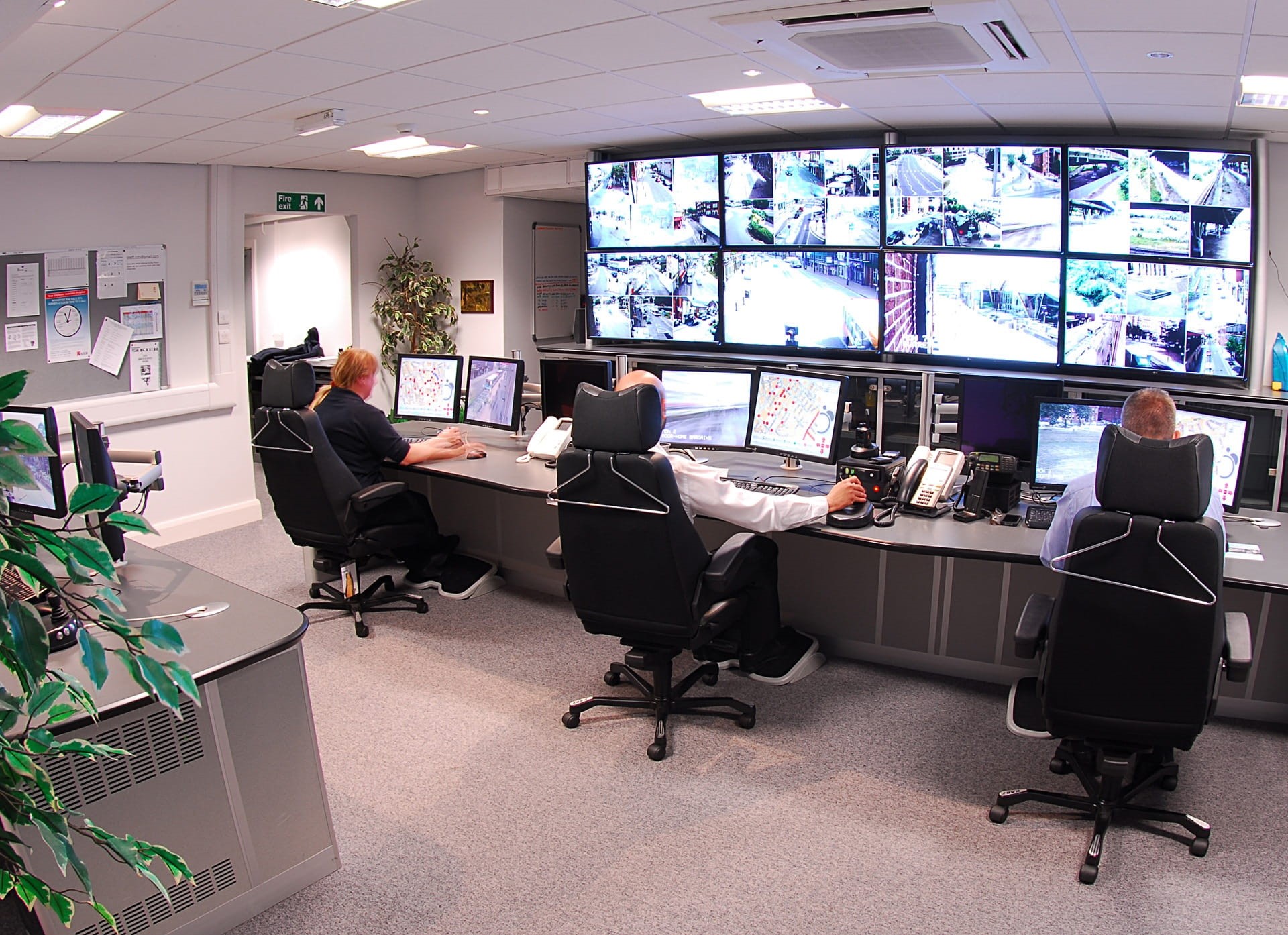 computer, chair, occupation, control room, table, people, security staff, furniture, indoors, communication, camera, technology, watching, jobsite security camera systems, HD Wallpaper