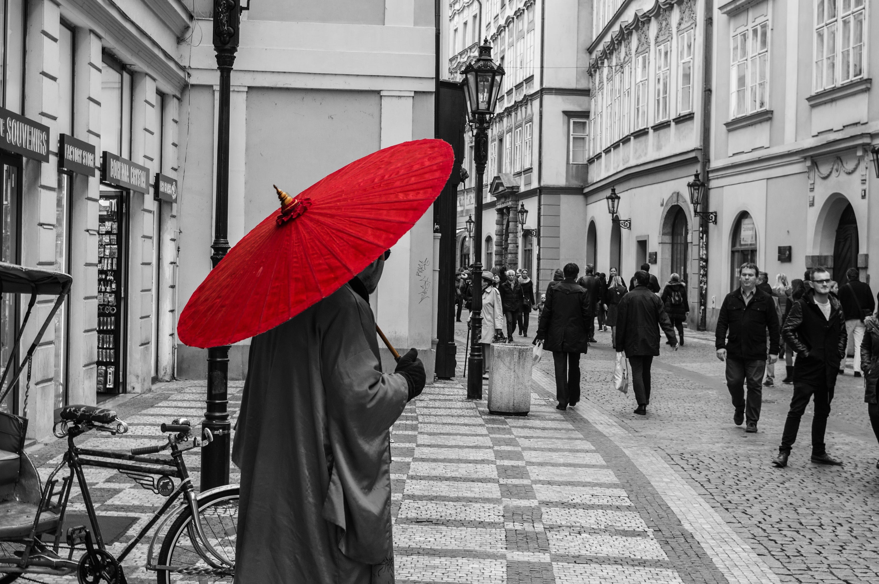 holding, umbrella, people, red, selective, street, city, built structure, building, real people, 2K, building exterior, black and white, walking, adult, HD Wallpaper