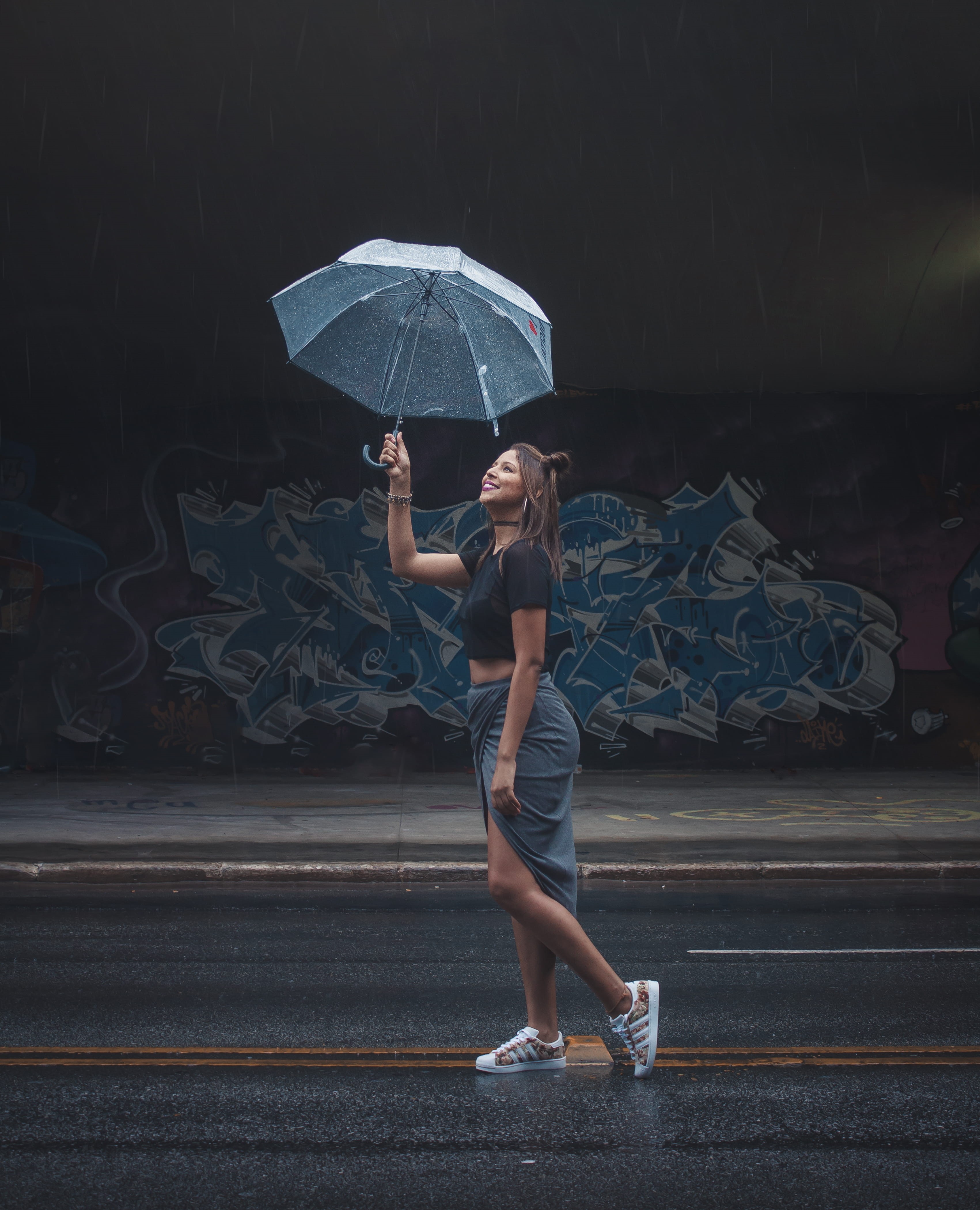 lifestyles, wet, women, front view, real people, full length, care, wear, umbrella, security, standing, casual clothing, woman, holding, rain, one person, Phone HD Wallpaper