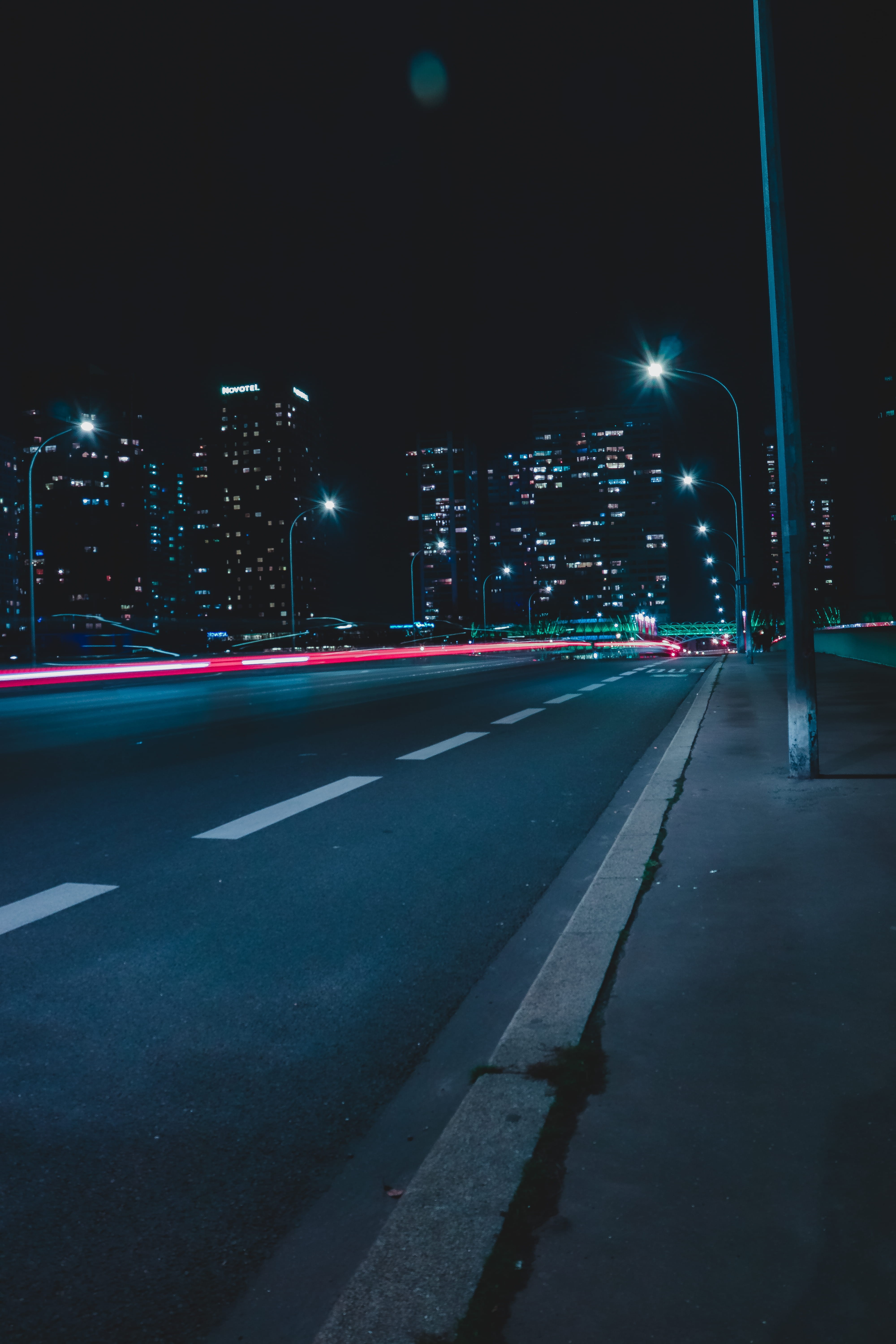 coin, long exposure, lights, symbol, clothing, 5K, sign, building exterior, overpass, skyscraper, paris by night, tarmac, asphalt, road, street light, Phone HD Wallpaper