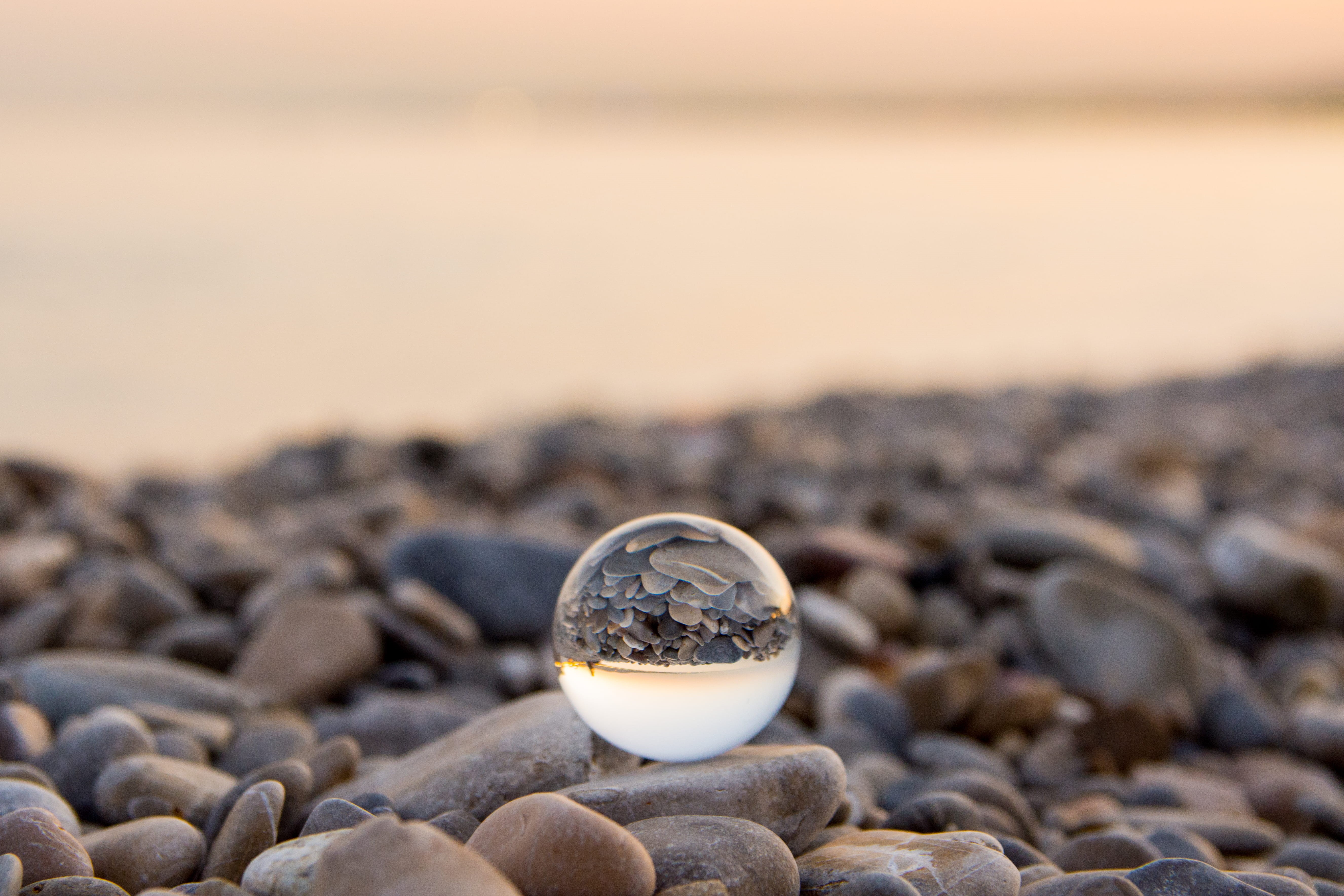 marble, relaxation, pebble, tranquil Scene, rock - Object, toy, animal Shell, sunlight, concepts, copy Space, bokeh, glass sphere, backgrounds, coastline, HD Wallpaper