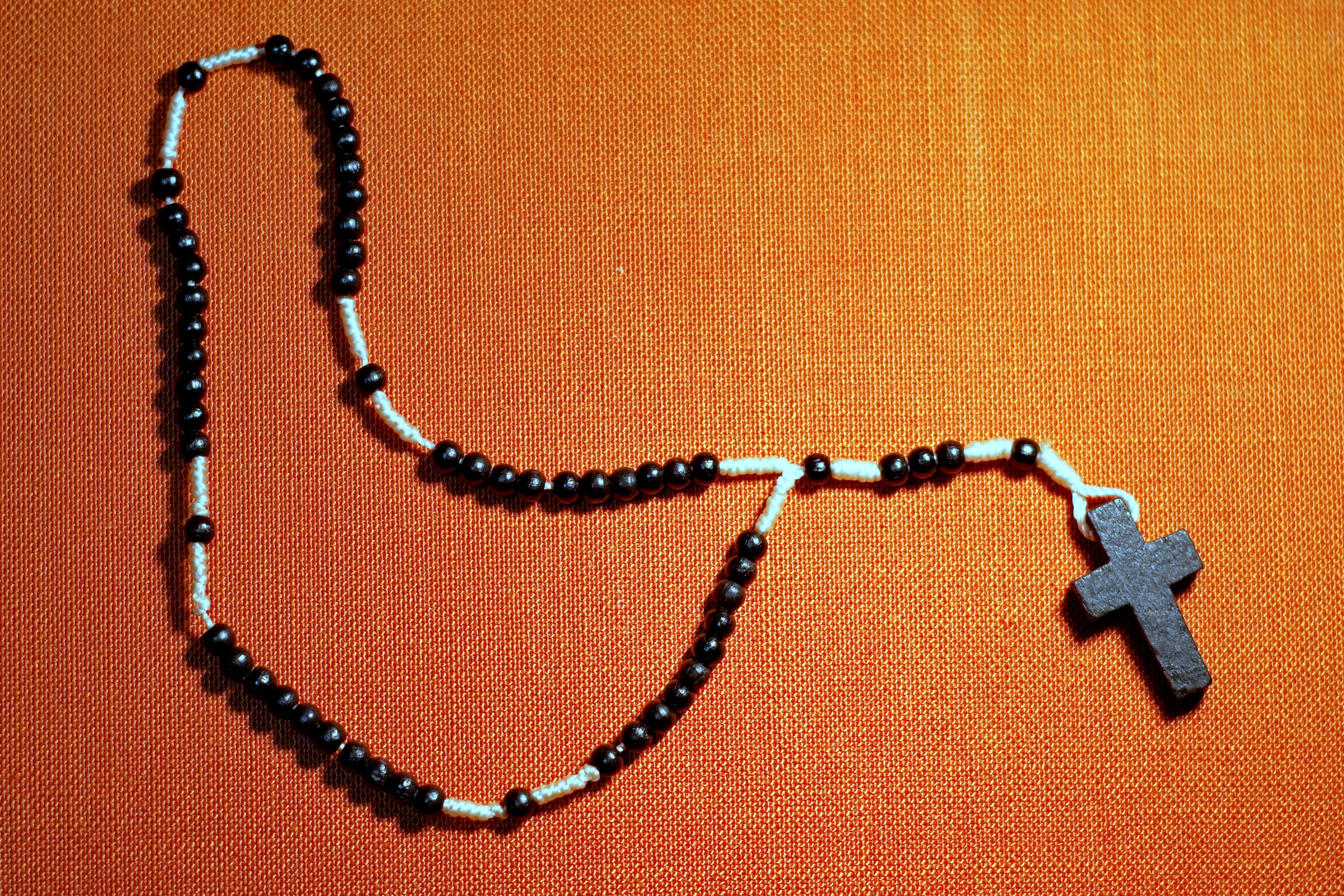 chain, catholicism, indoors, catholic, bracelet, christianity, sacrament, devotion, bead, studio shot, religious, rosary, jesus, orange color, black, emotion, HD Wallpaper