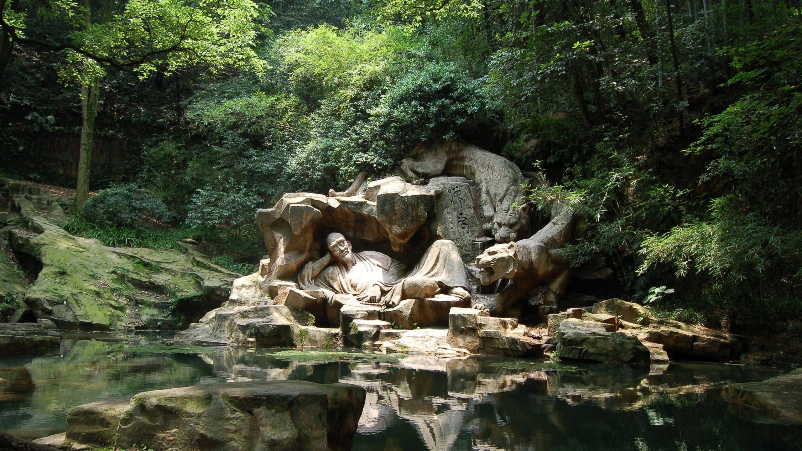 lying, outdoors, man, forest, art and craft, human representation, day, no people, solid, growth, 2K, flowing water, representation, tiger, lake, rock - object, HD Wallpaper