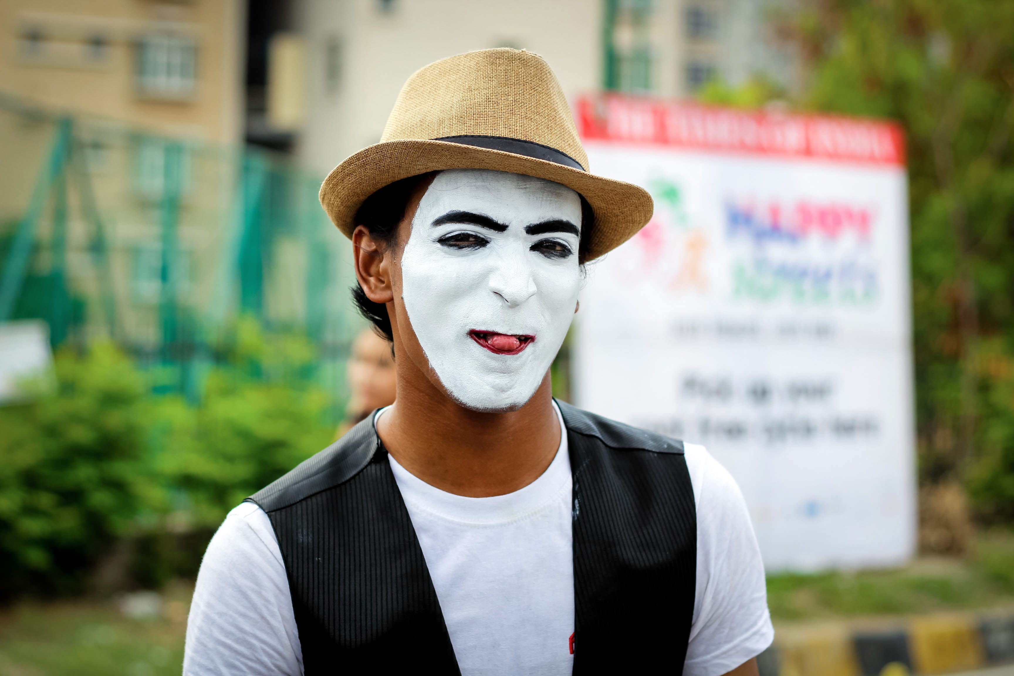 day, outdoors, portrait, emotion, one person, human mouth, looking, fun, fedora, 2K, photography, tongue, happy, focus, hat, face paint, creativity, headshot, HD Wallpaper