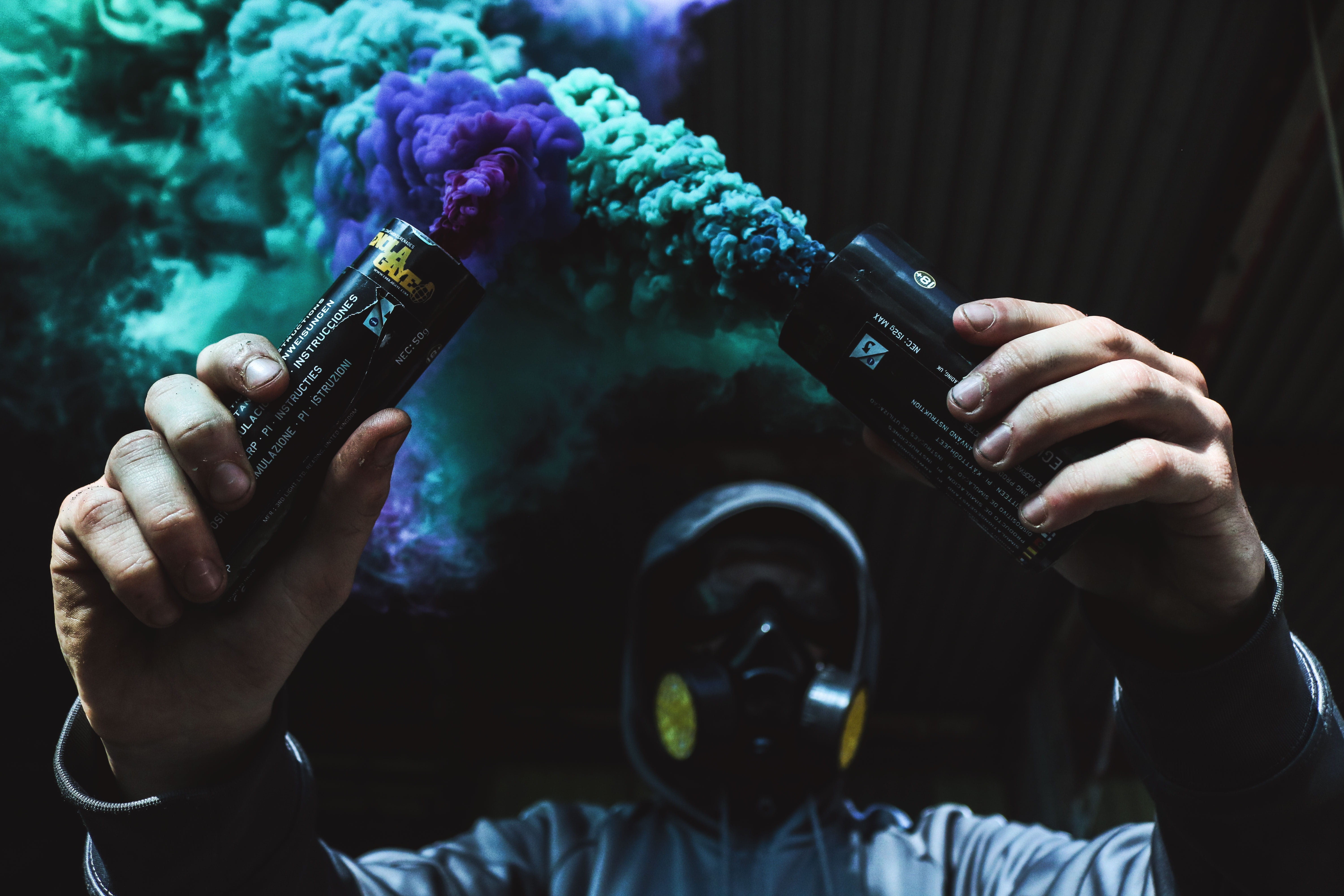 one person, gas, indoors, man, mask, holding, activity, gas mask, person, tear, respirator, occupation, real people, photographing, headshot, smoke grenade, HD Wallpaper