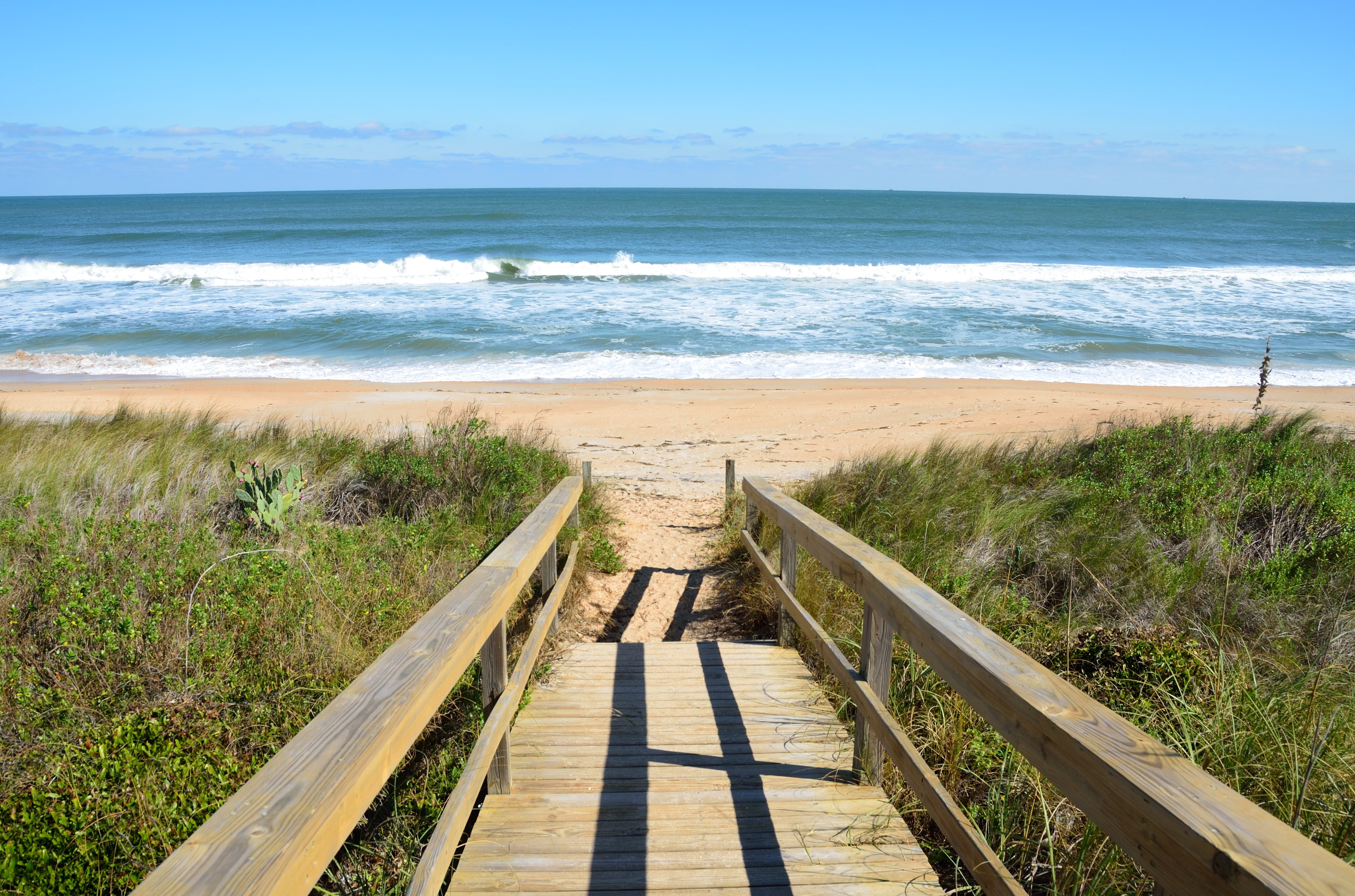 no people, beach, blue, walkway, grass, seaside, horizon over water, nature, near, coast, vacation, sky, footpath, seashore, water, seascape, sunny, railing, HD Wallpaper