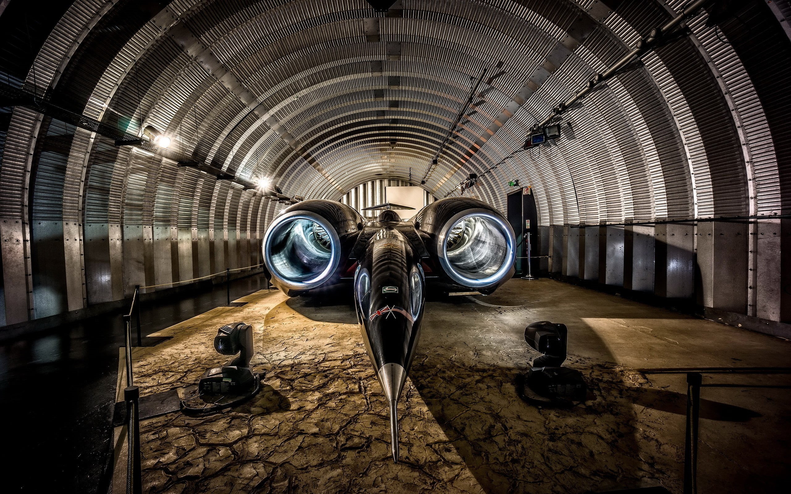 technology, indoors, Thrust SSC, tunnel, machine, 2K, no people, space, vehicle, illuminated, digital art, architecture, arch, metal, ceiling, transportation, HD Wallpaper