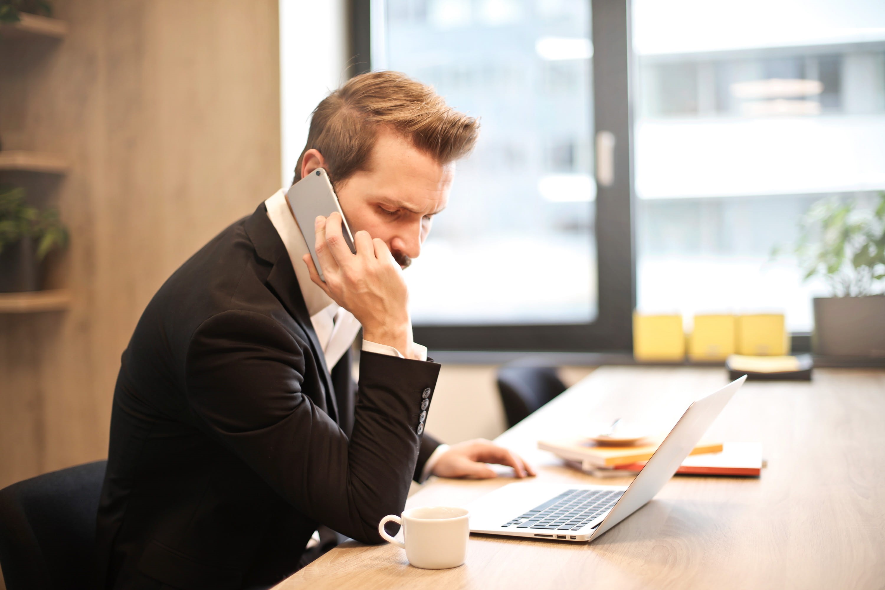 work, daytime, job, sitting, cellphone, listening, modern, looking, doubt, design, talking, success, laptop, using laptop, pc, using phone, caucasian, beard, HD Wallpaper