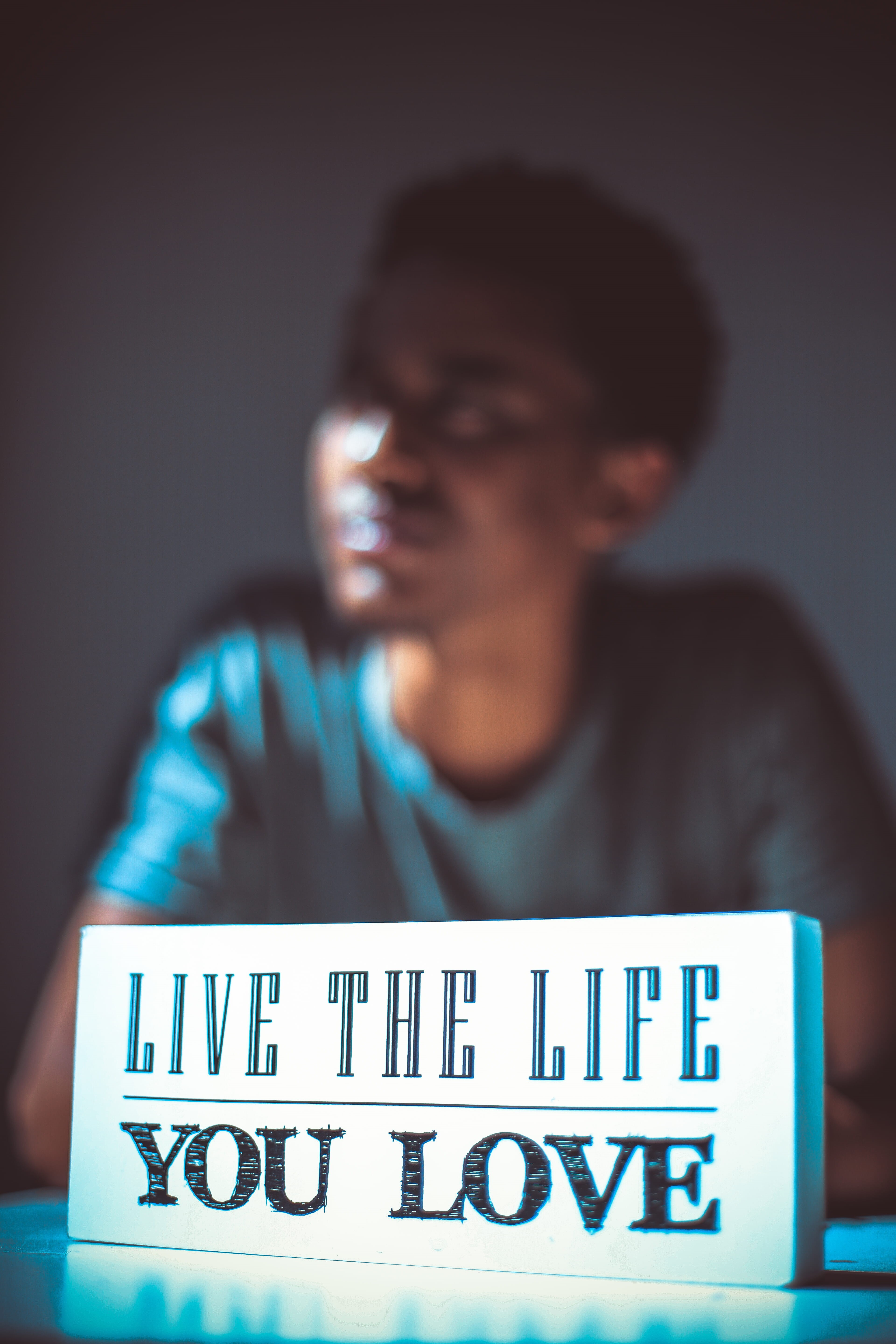 looking, light, signage, 5K, indoors, face, portrait photography, text, advertisement, adult, flyer, communication, paper, human, bokeh, close-up, lifestyles, Phone HD Wallpaper
