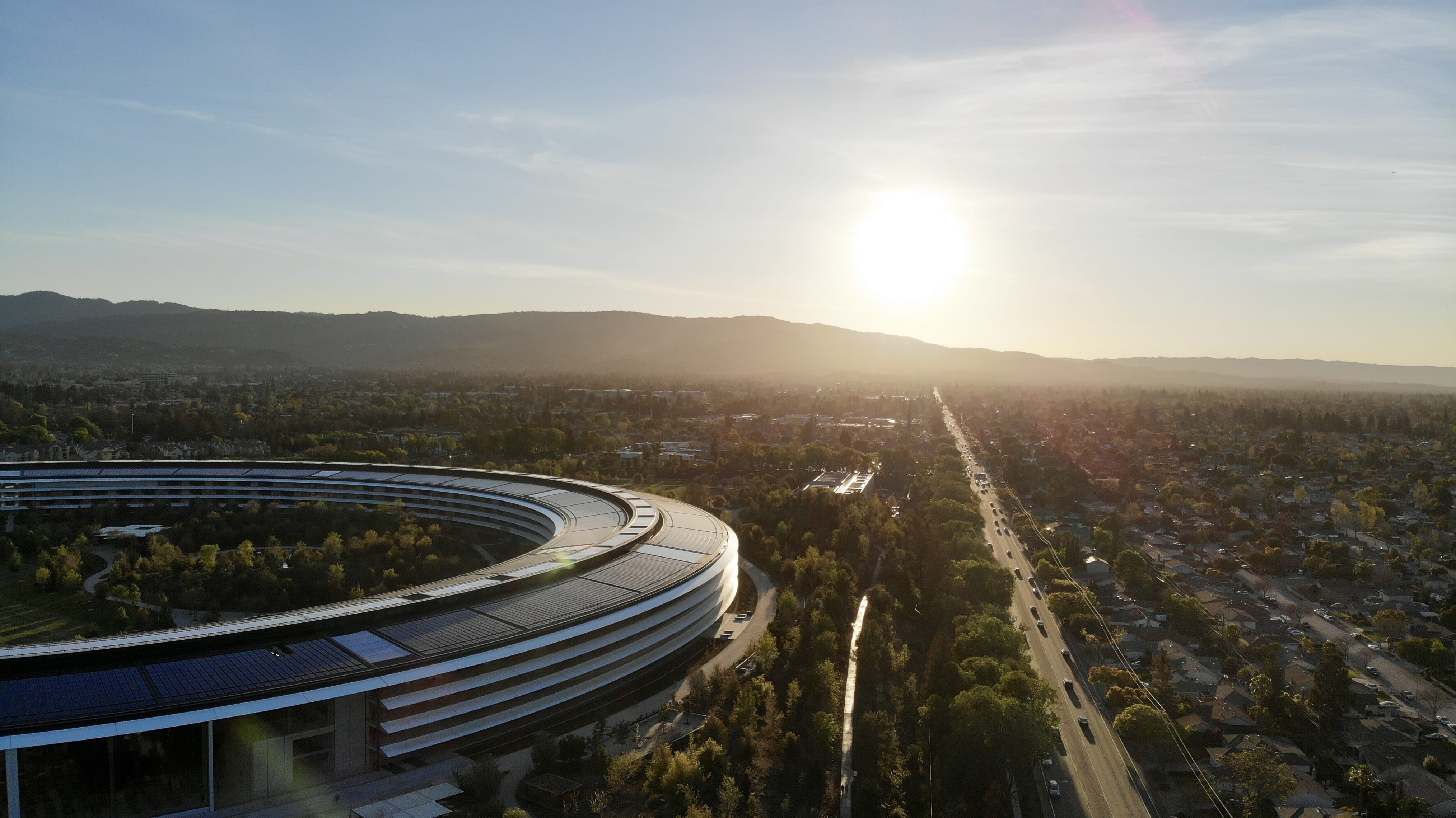 drone view, mountain, highway, plant, aerial view, nature, angle, sun, landscape, office building, architecture, downtown, built structure, tree, 4K, lens flare, HD Wallpaper