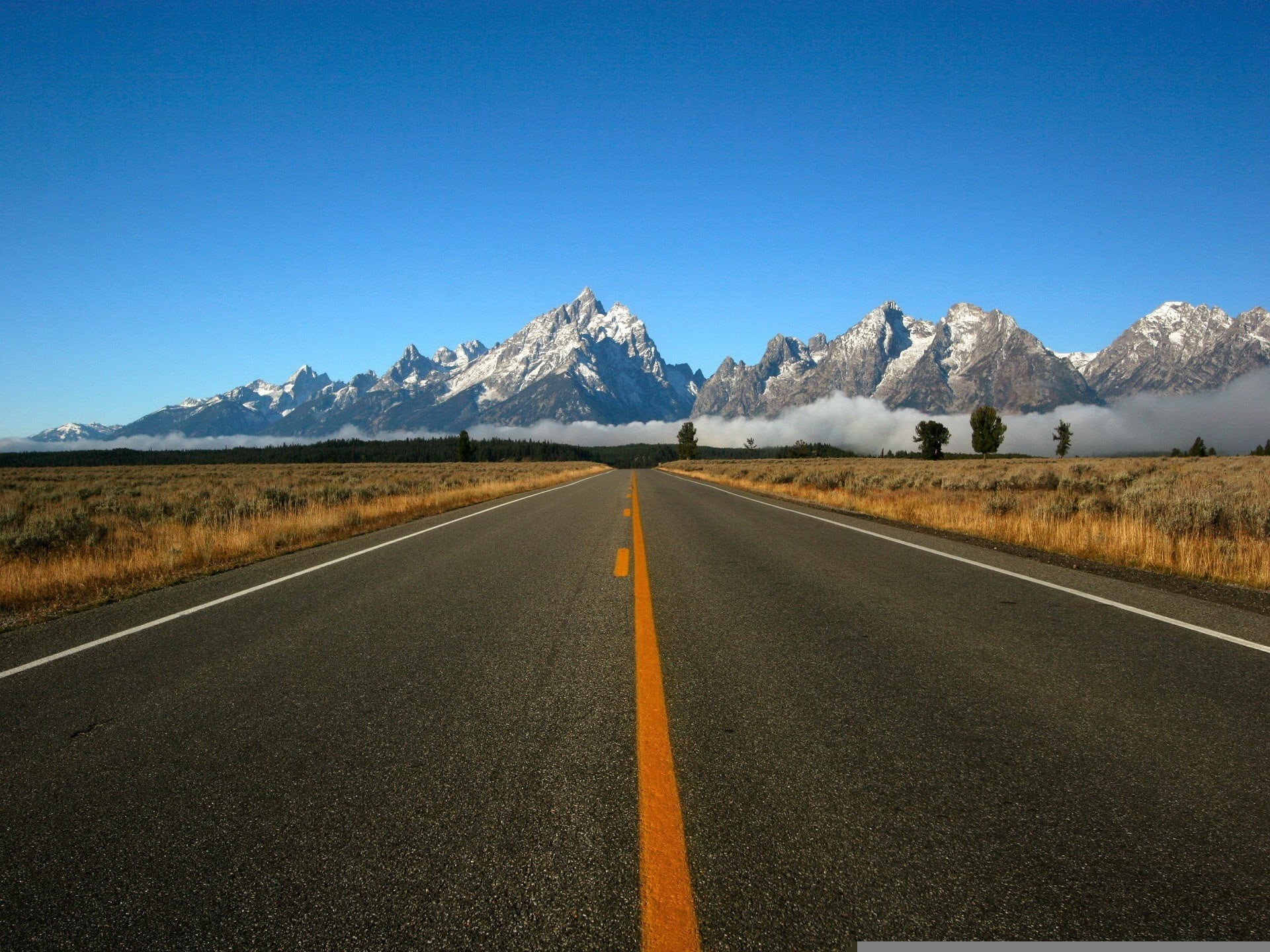 grand Teton National Park, beauty In Nature, journey, wyoming, canada, road, yellow, summer, line, no People, uSA, blue, fog, mountain Range, symbol, scenics, HD Wallpaper
