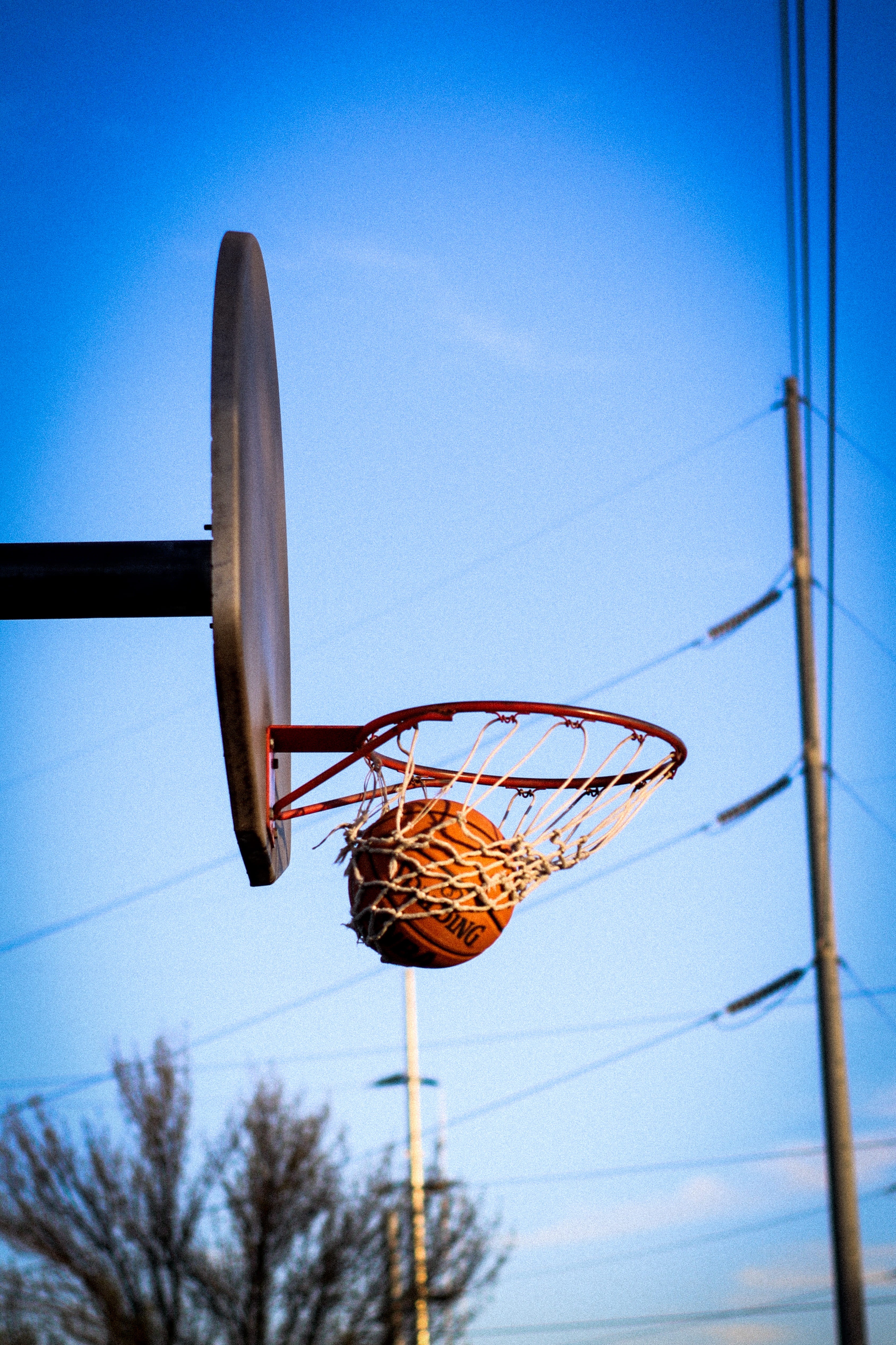 focus on foreground, basketball ring, basketball - sport, Basketball Hoop, copy space, sport, no people, blue, day, low angle view, outdoors, basketball, Phone HD Wallpaper