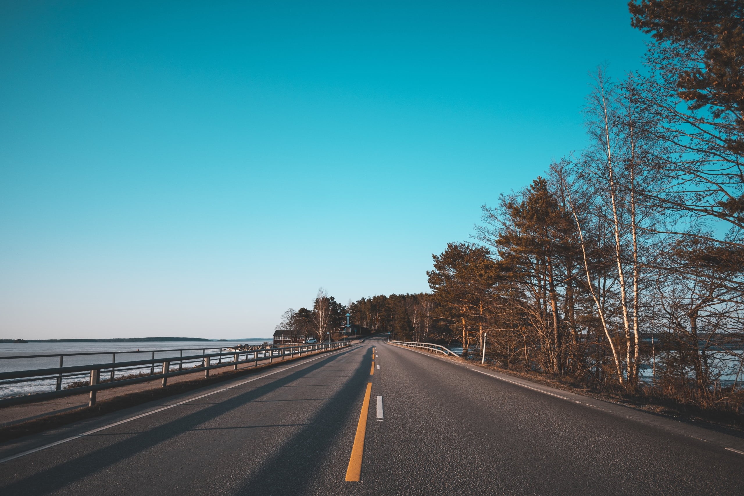 nature, clear sky, plant, no people, connection, gray, day, 2K, symbol, vanishing point, asphalt, outdoors, bridge, copy space, sky, direction, blue, long, HD Wallpaper