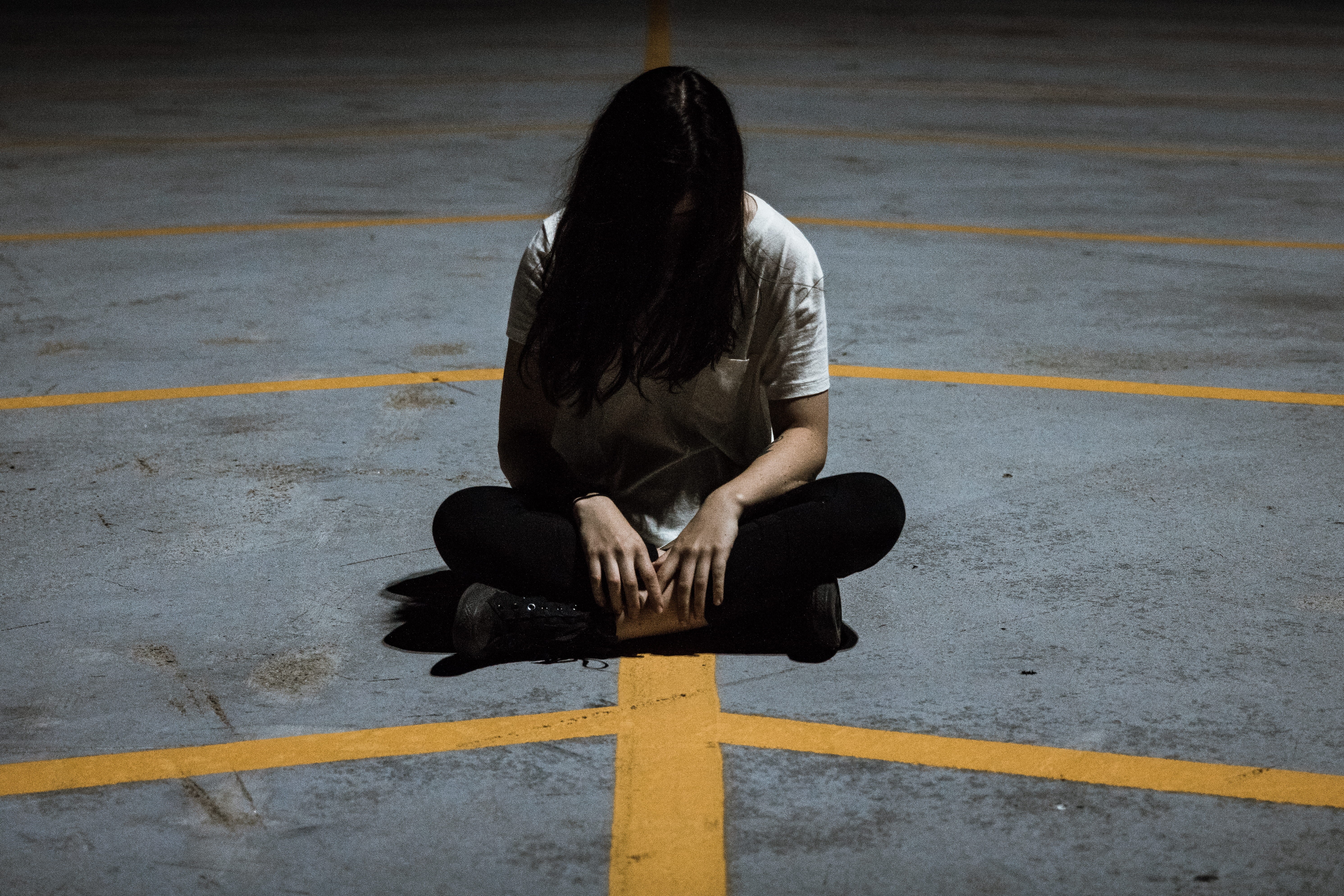 hopelessness, street, car park, girl, road marking, marking, obscured face, sitting, yellow line, yellow, shadow, full length, city, lines, woman, concrete, HD Wallpaper