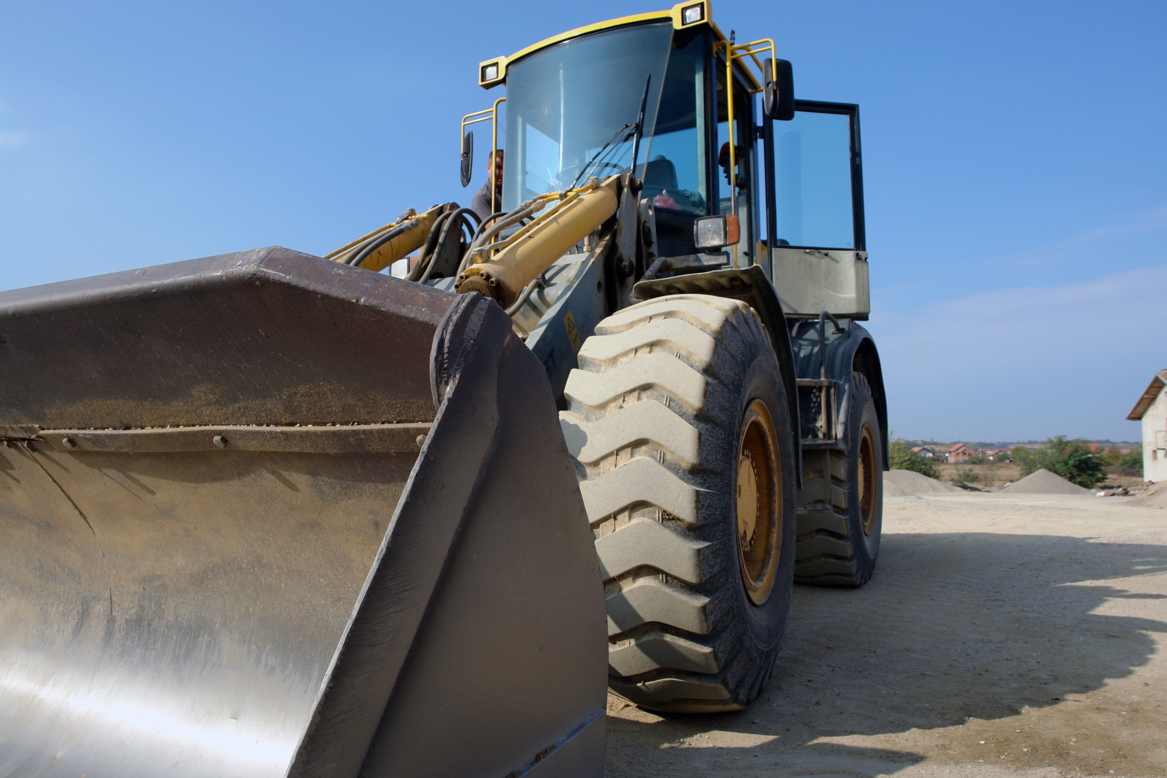 excavate, bulldozer, dust, yellow, dirt, tractor, construction vehicle, quarry, road, dirt road, 4K, construction equipment, ground, vehicle, sky, black, HD Wallpaper