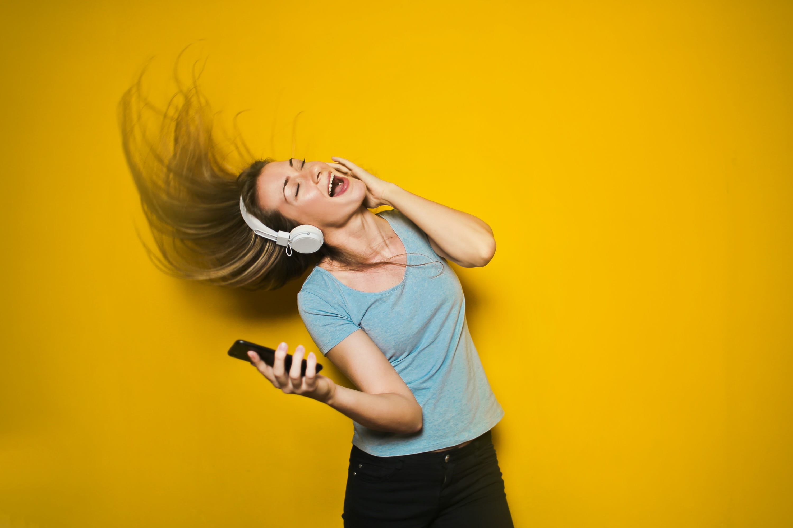 headphones, isolated on yellow background, Music, waist up, copy space, caucasian, device, studio shot, Lady, Denim, indoors, earphone, one person, photo shoot, HD Wallpaper