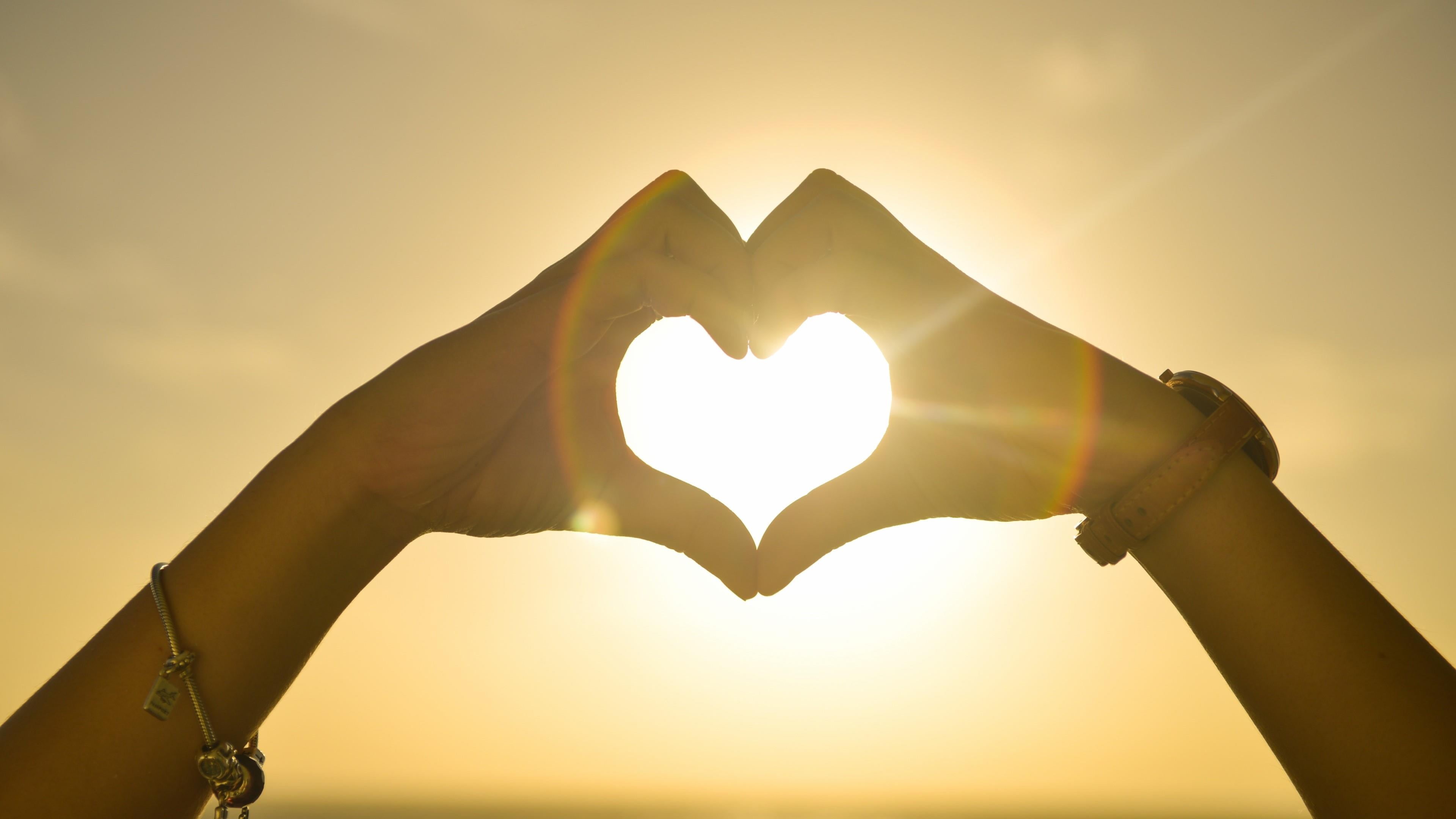 close-up, human hand, heart shape, sunlight, positive emotion, love, silhouette, human limb, design, 4K, hands, emotion, care, light, shape, body part, HD Wallpaper