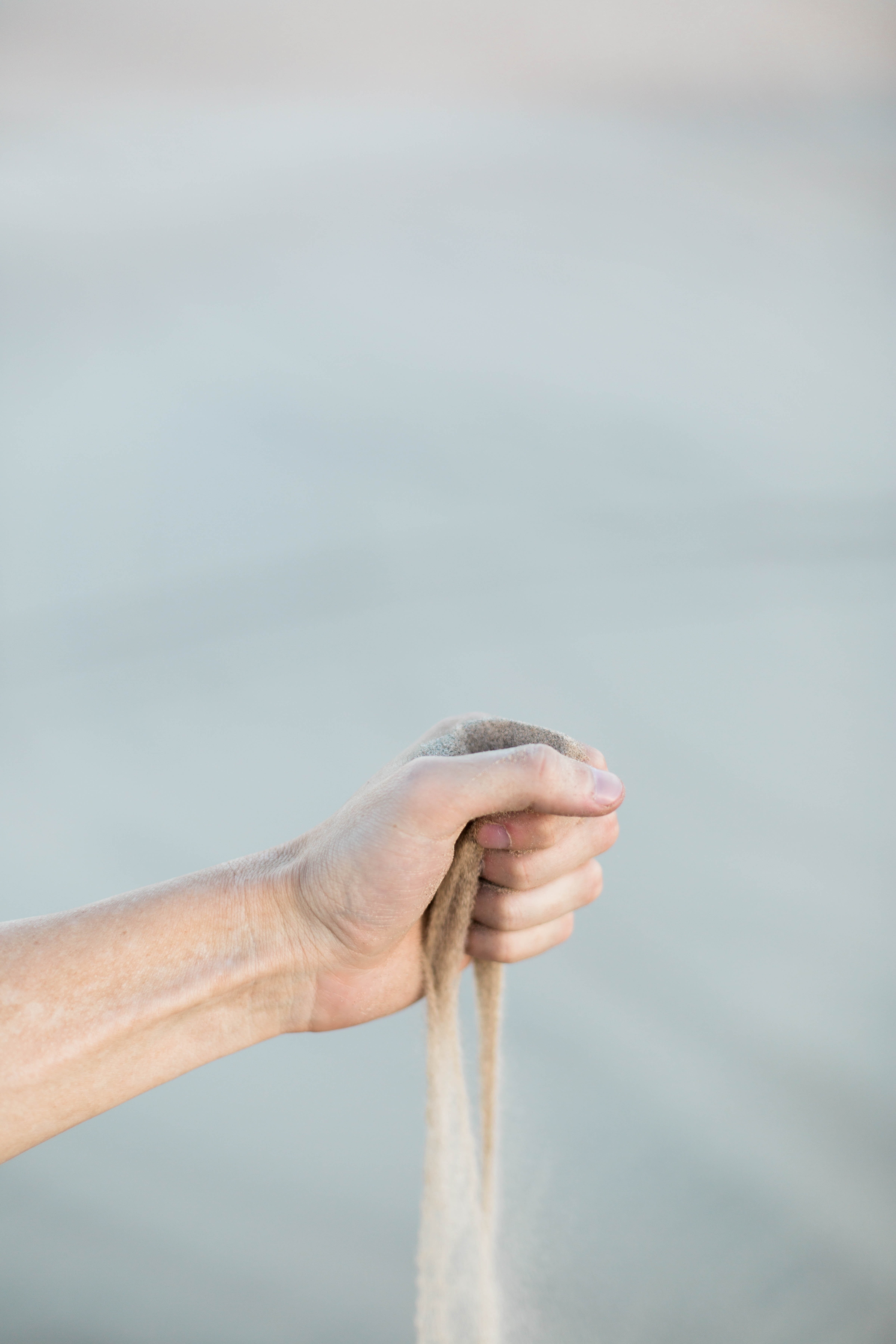 softness, environment, outdoors, close-up, human body part, arm, young adult, play, hand, water, nature, focus on foreground, sand, human limb, beach, holding, Phone HD Wallpaper