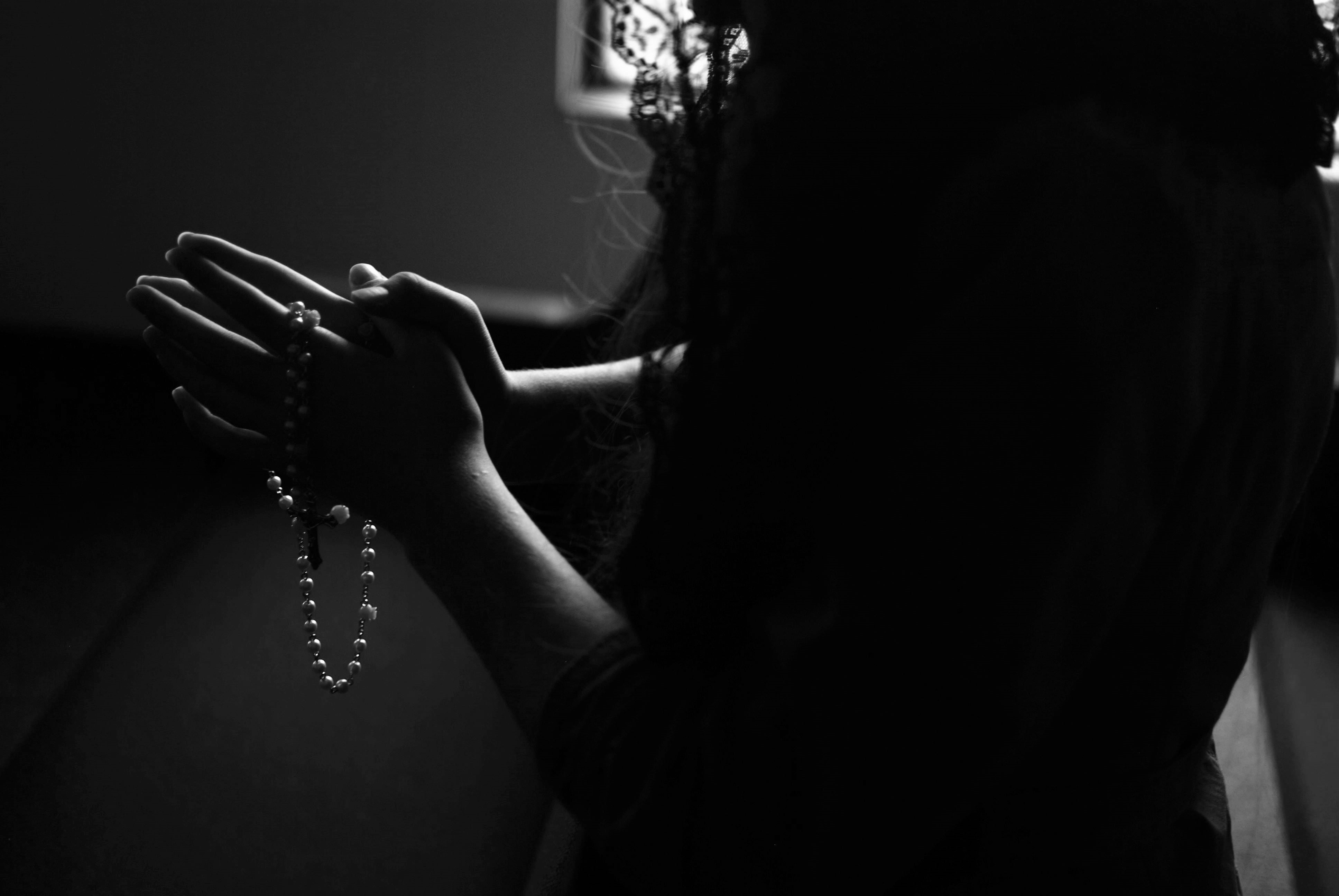 catholic, studio shot, hair, adult, dark, social issues, young adult, room, finger, women, holding, close-up, headshot, hand, black background, bead, portrait, HD Wallpaper