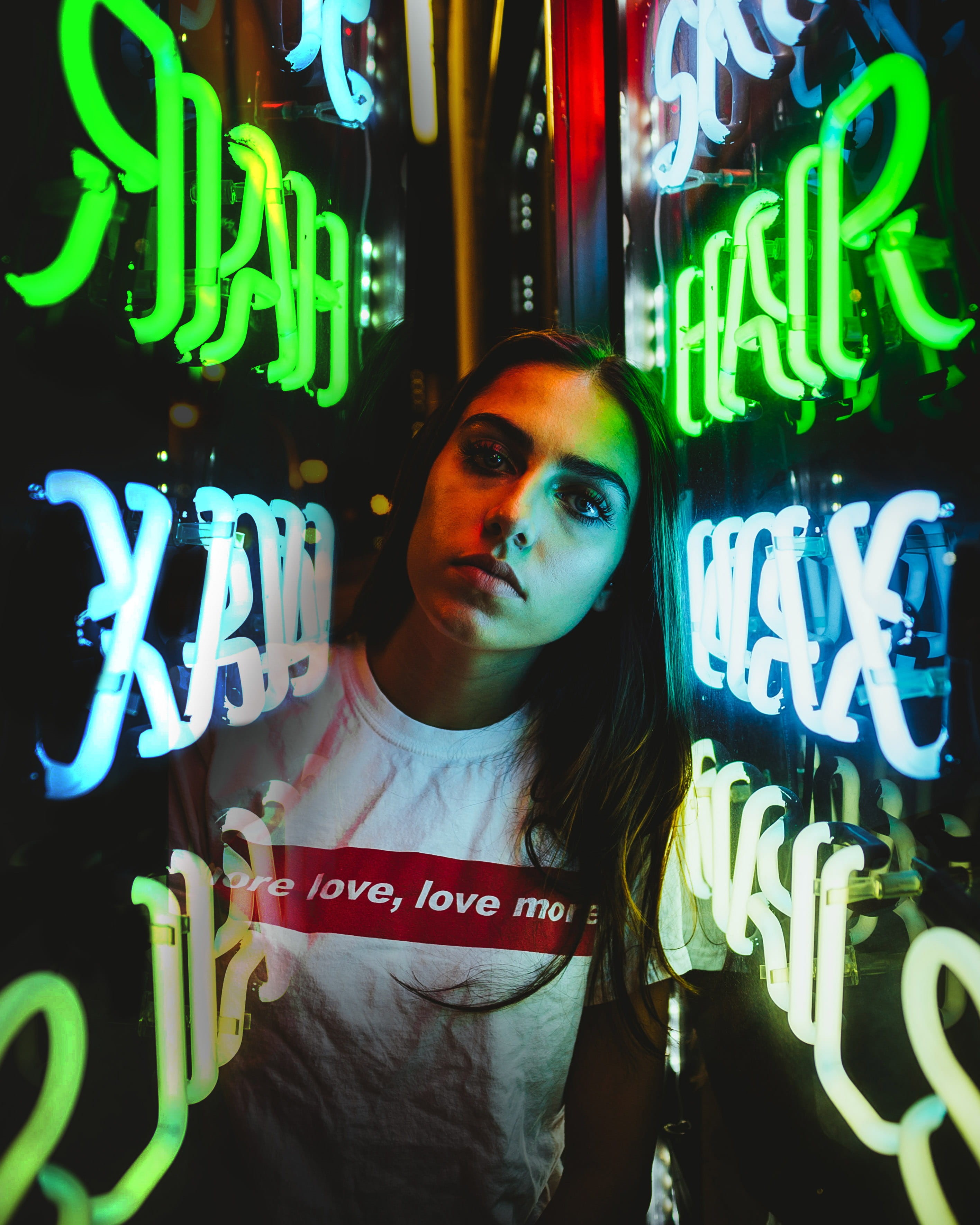 woman, close-up, portrait, casual clothing, neon sign, lights, signalise, illuminated, looking at camera, evening, real people, western script, communication, Phone HD Wallpaper
