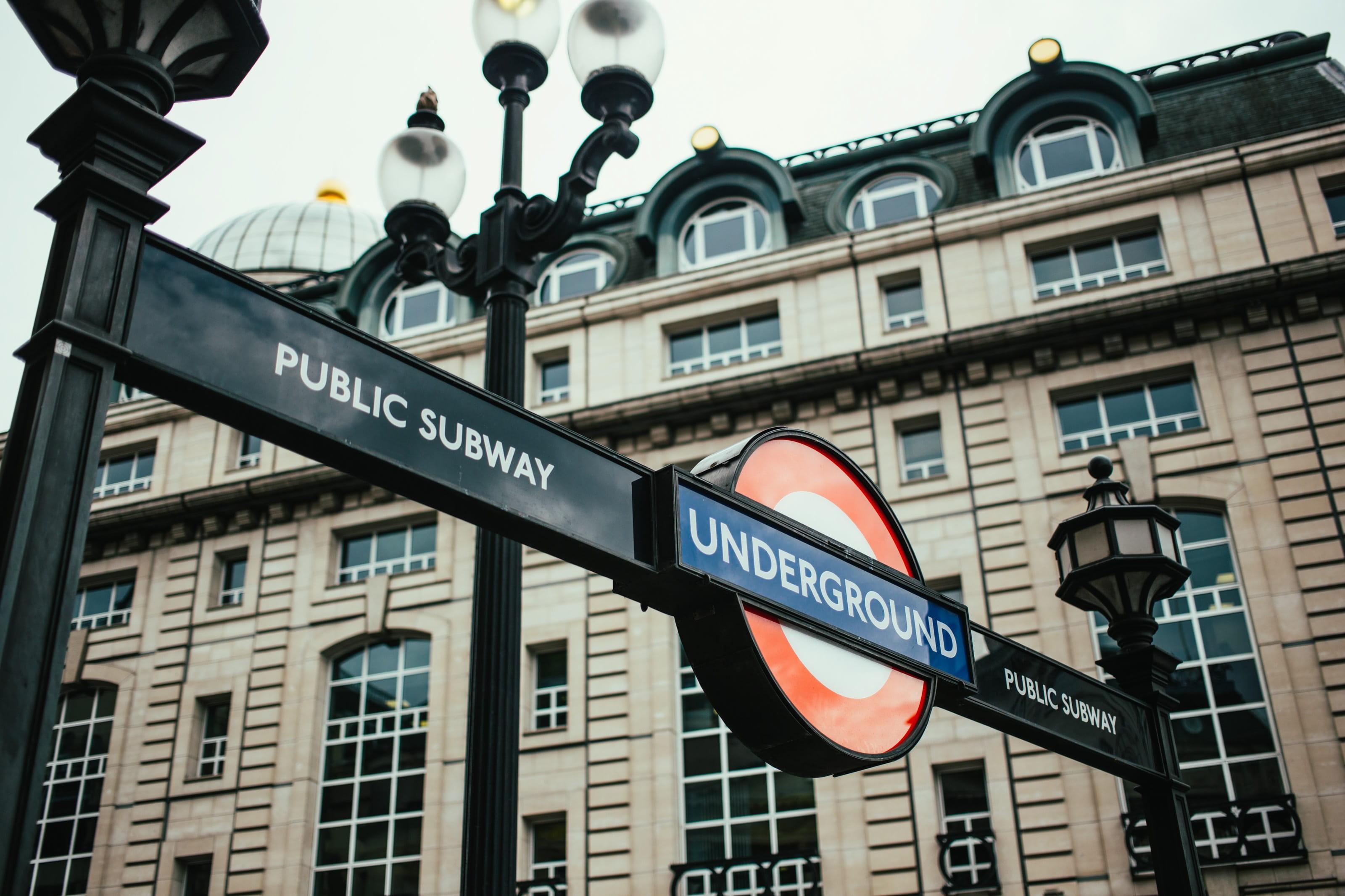 lighting equipment, road sign, britain, day, built structure, low angle view, outdoors, metro, view, street light, western script, city, destinations, system, HD Wallpaper