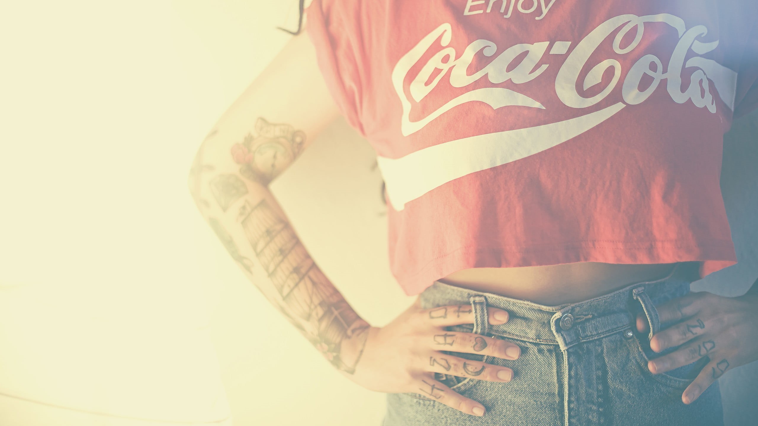 2K, one person, shirt, midsection, coca, text, western script, communication, real people, holding, human body part, adult, tattoo, model, indoors, jeans, HD Wallpaper
