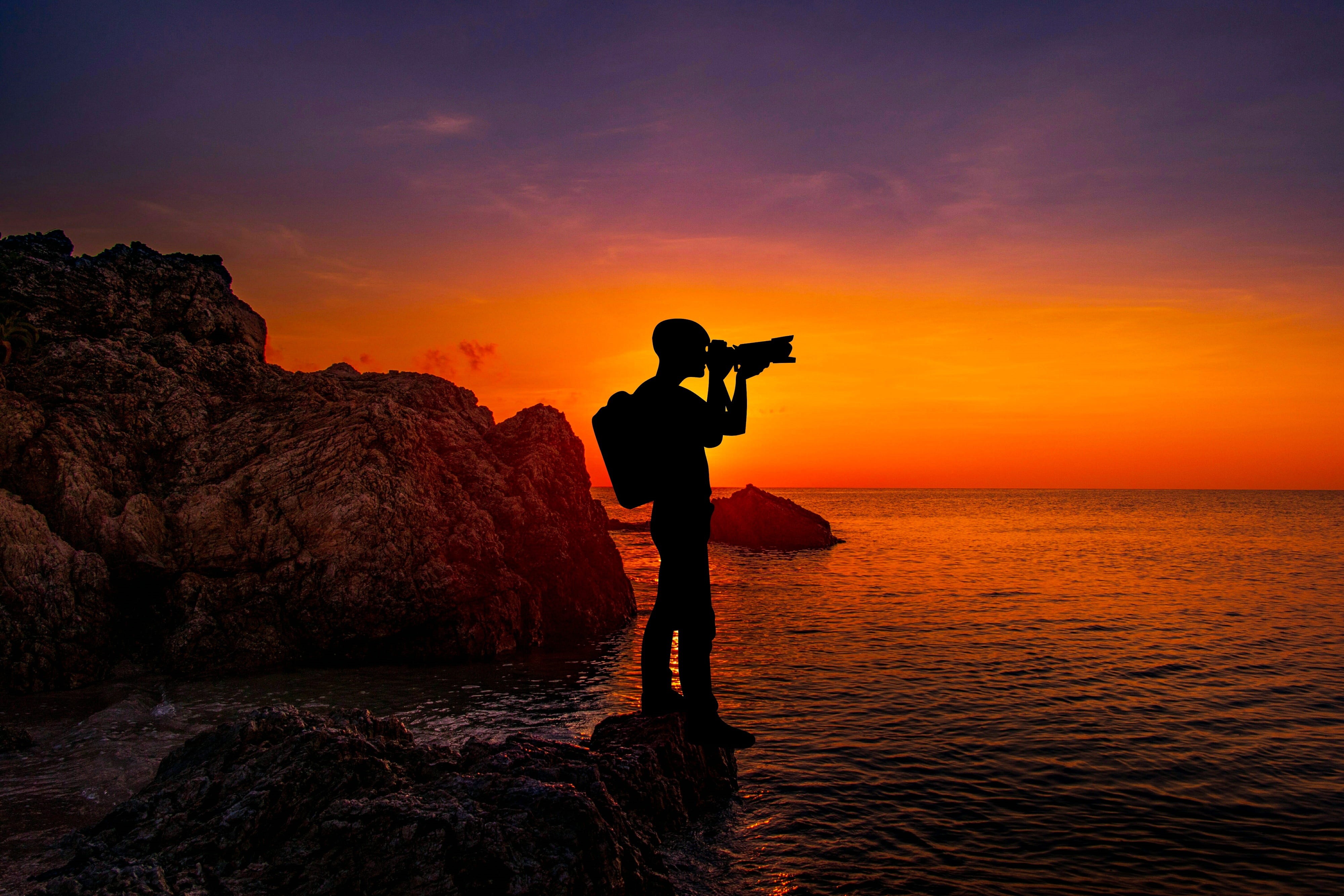 dusk, one person, rock - object, leisure activity, full length, scenics - nature, outdoors, photography, photo, rock, sun, horizon over water, lifestyles, HD Wallpaper