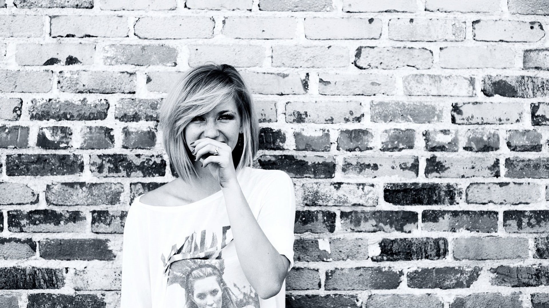 brick, front view, young adult, one person, blonde, young women, built structure, brick wall, hairstyle, emotion, making a face, Ellie Goulding, looking at camera, HD Wallpaper
