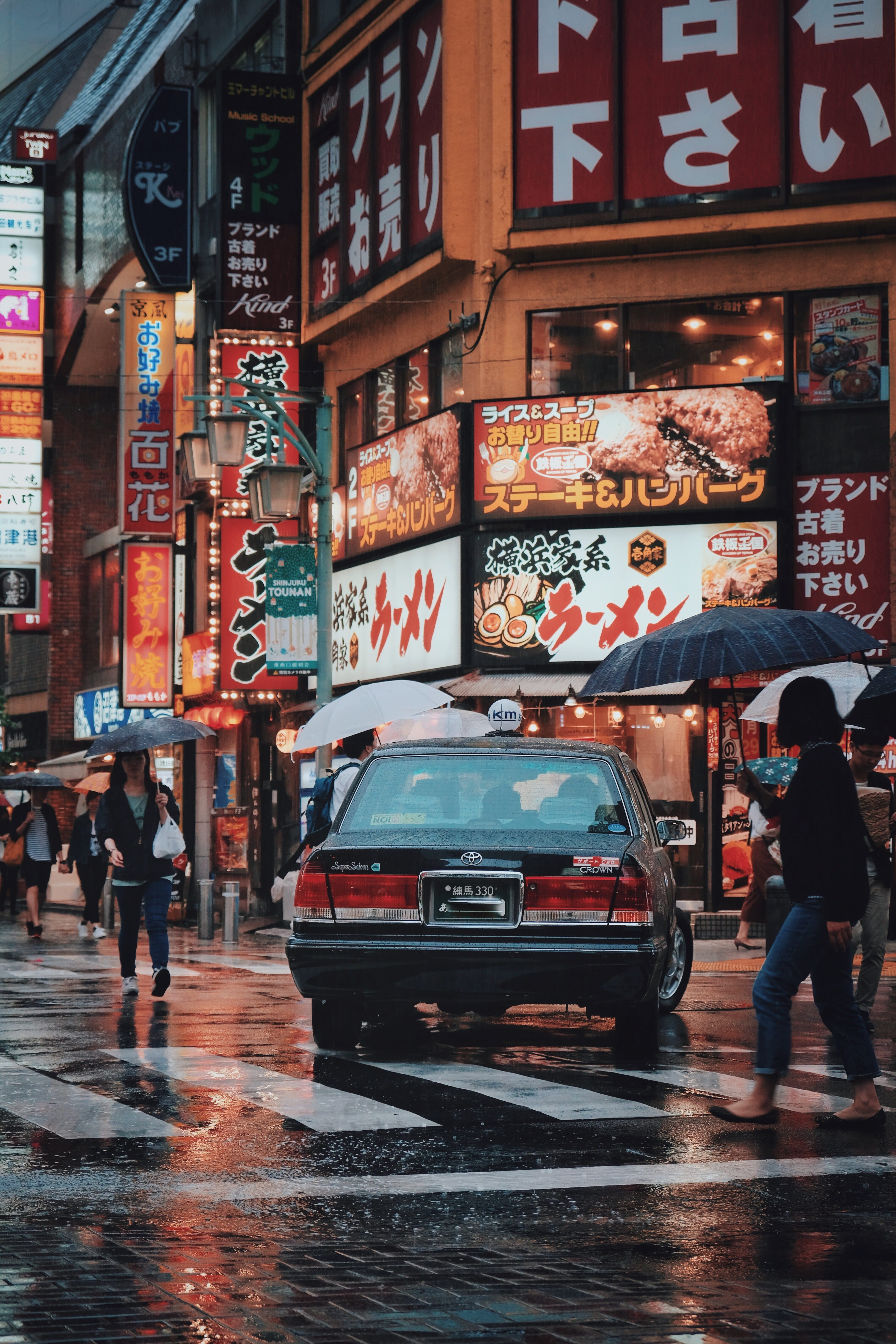 architecture, asian, black, billboard, asia, candid, communication, transportation, wet, toyota, pedestrian, near, real people, rainy, motor vehicle, outdoors, Phone HD Wallpaper