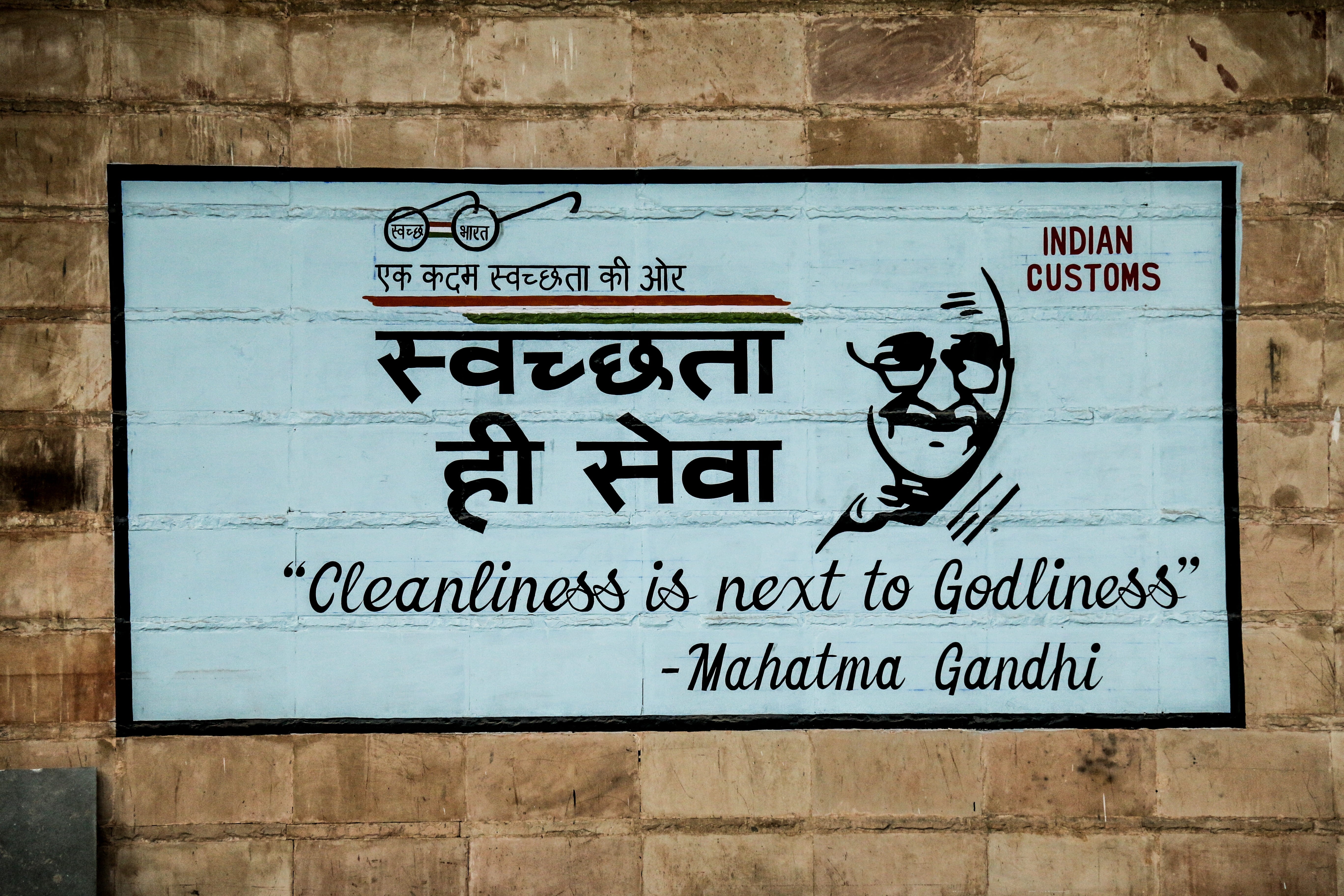 information sign, postal office, plaque, wall, symbol, creativity, appliance, human representation, wall - building feature, mahatma, calligraphy, brick, HD Wallpaper