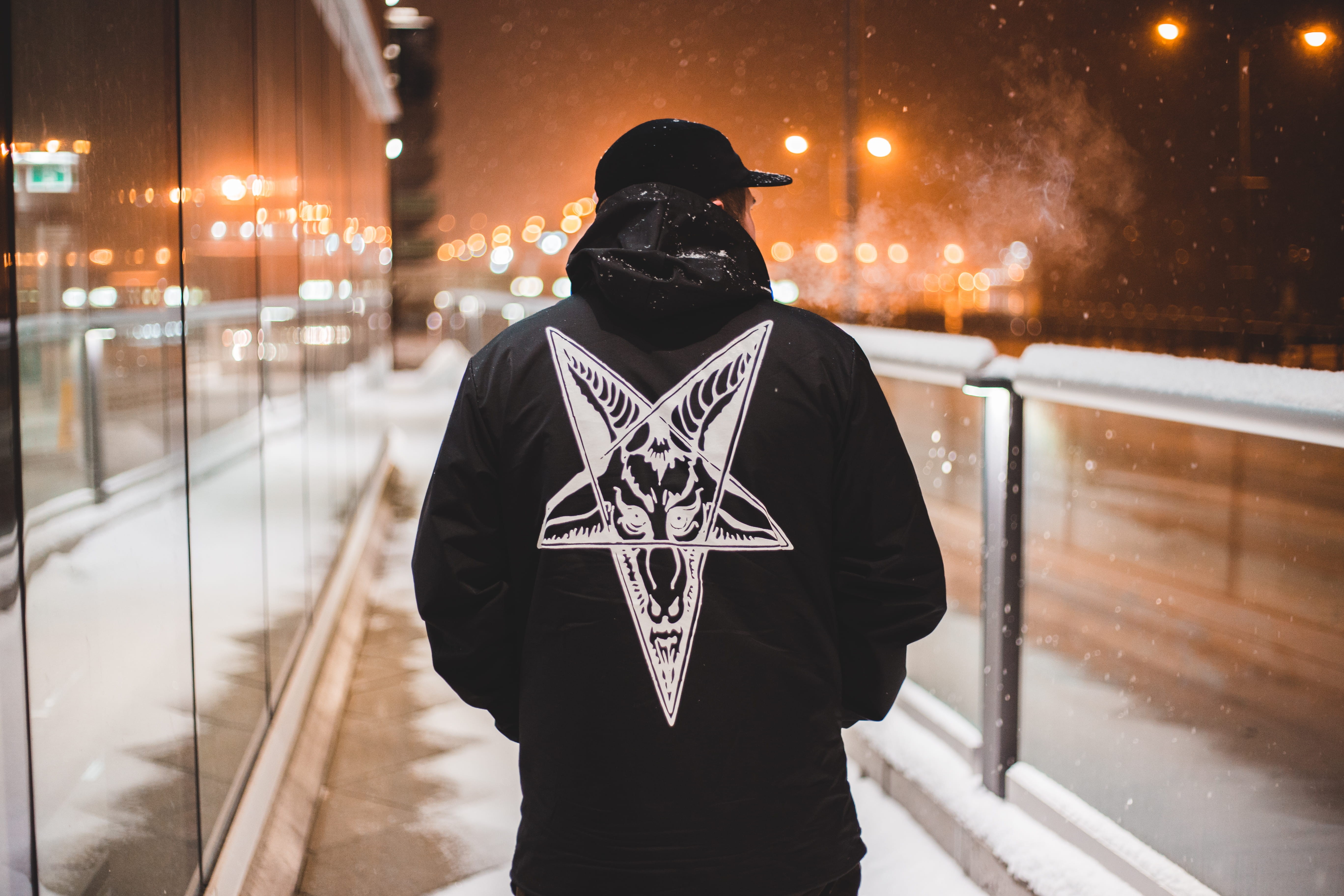 photo, helmet, illuminated, face, focus on foreground, person, clothing, nighttime, sweater, star symbol, black, hoodie, warm clothing, snow, pullover, HD Wallpaper