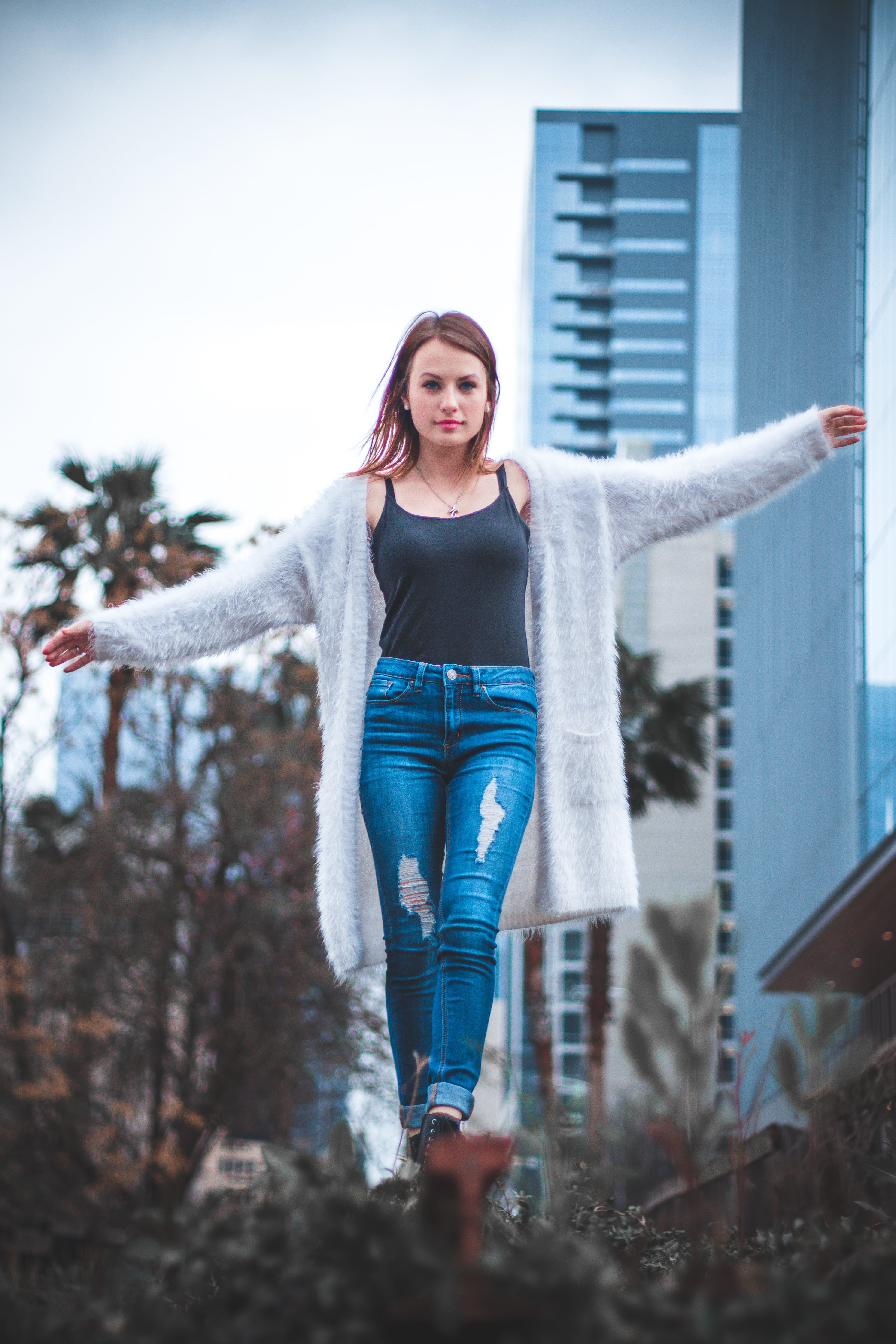leisure activity, tights, smiling, clothing, emotion, portraits, runway, wearing, young adult, long sleeve, standing, human, sweatshirt, front view, white, Phone HD Wallpaper