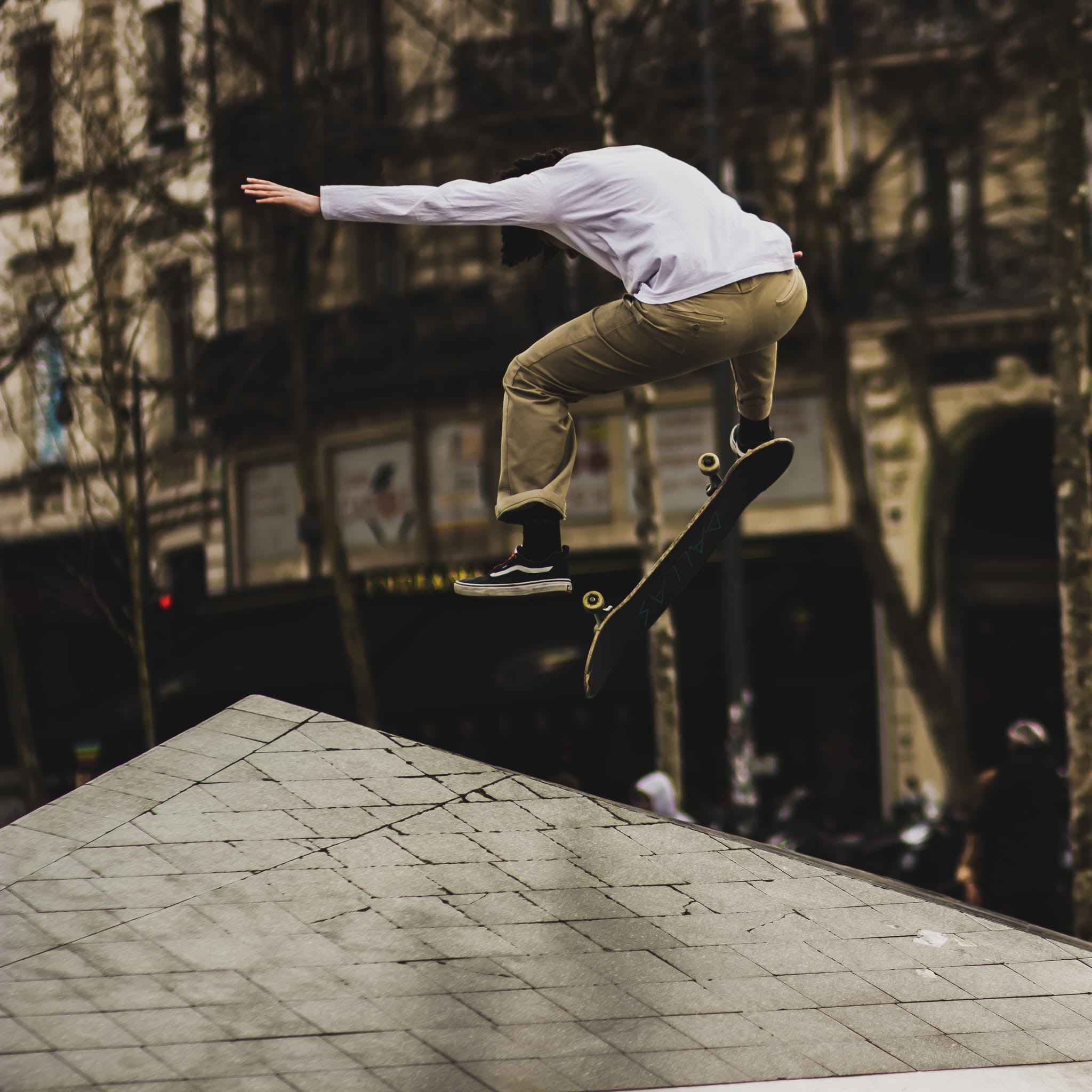 recreation, mid-air, focus on foreground, skater, building exterior, jumping, day, jump, human arm, skate park, playing, full length, skateboarding, person, Phone HD Wallpaper