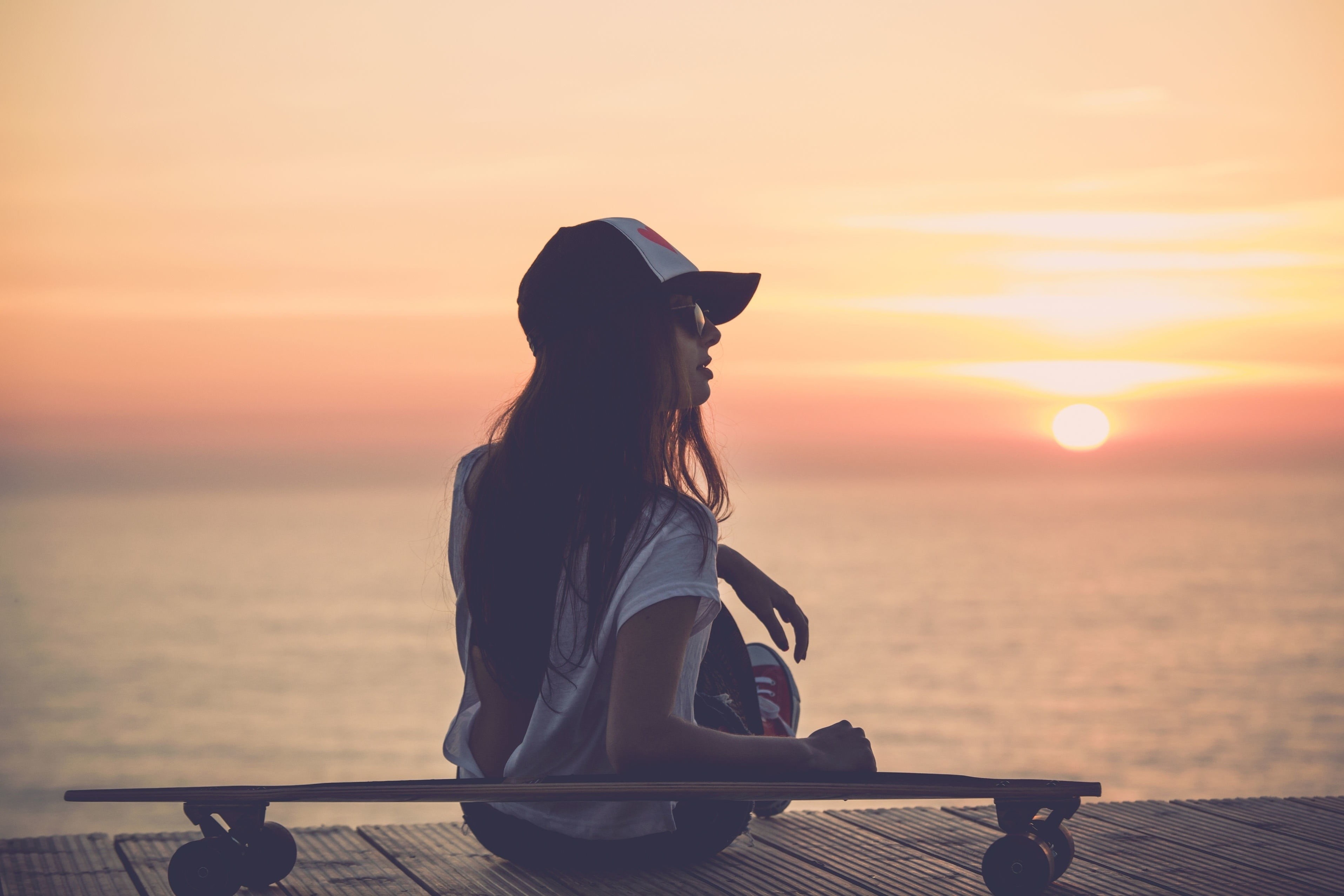 sky, leisure activity, 2K, adult, skateboarding, women, one person, skateboard, sunlight, outdoors, beauty in nature, water, hat, scenics - nature, real people, HD Wallpaper