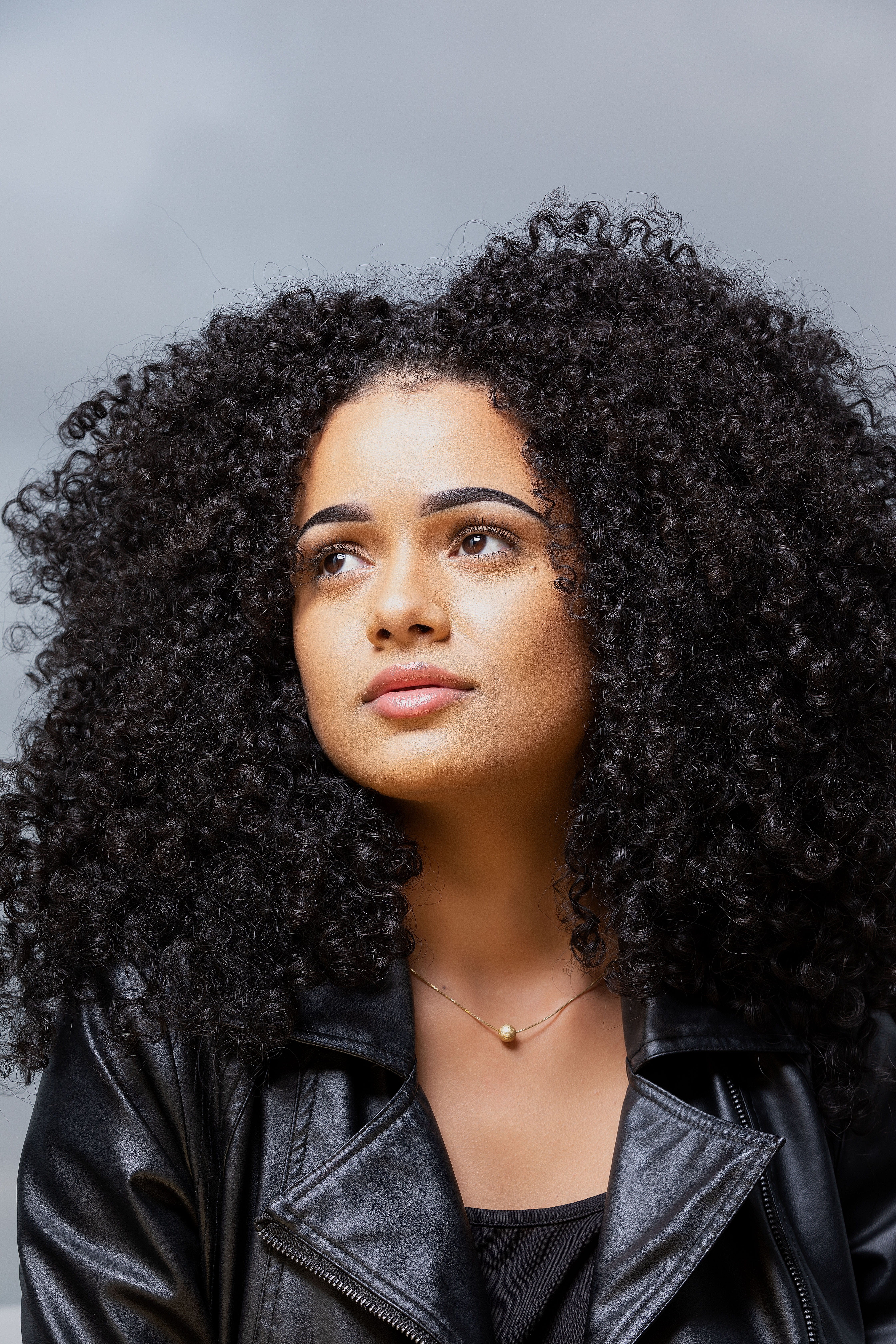 attractive, hairstyle, human face, black, facial expression, looking at camera, 5K, eyes, young adult, female, jacket, serious, person, leisure activity, Phone HD Wallpaper