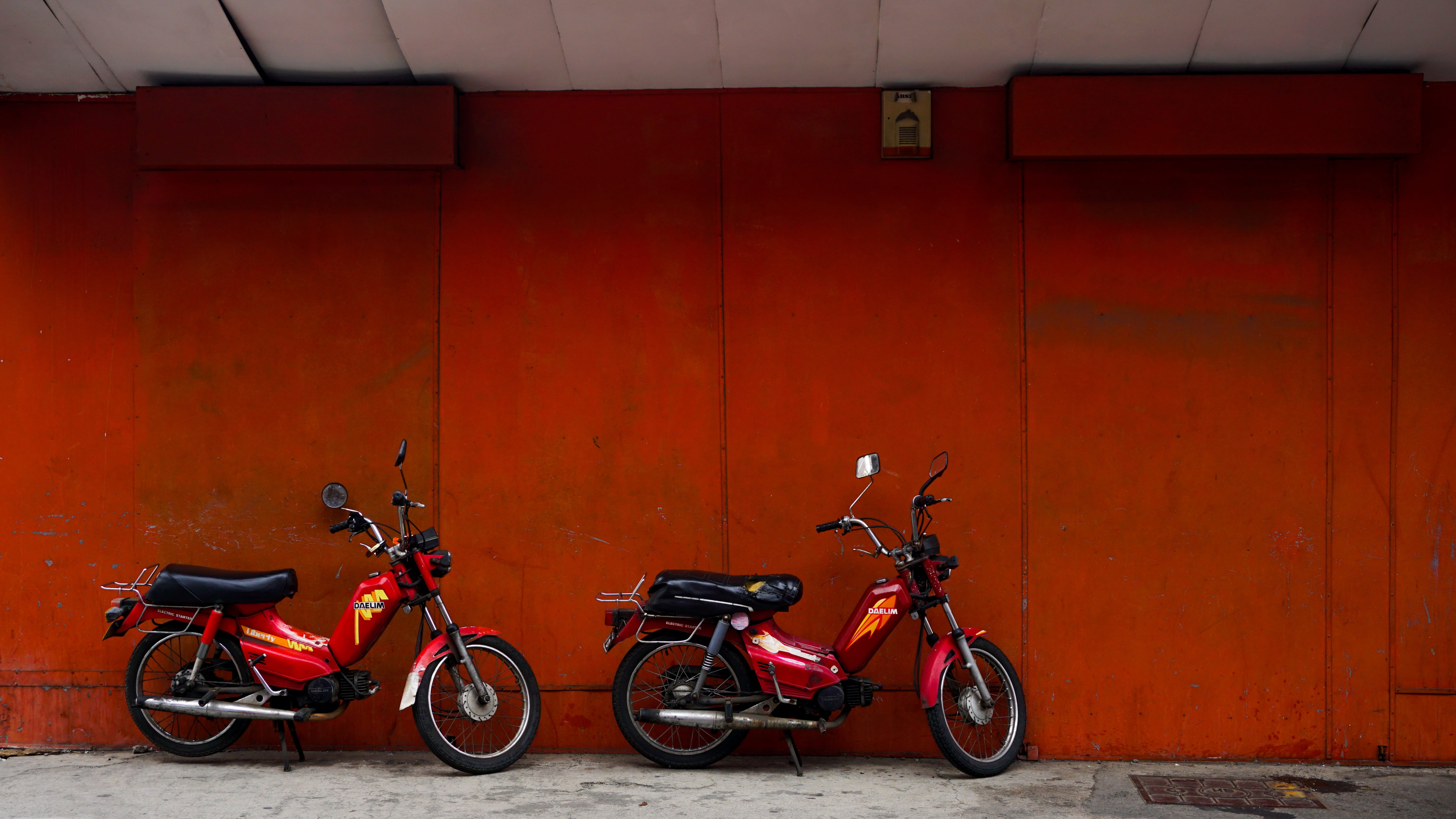 orange, outdoors, port louis, side view, two, moped, parked, stationary, land vehicle, bicycle, pair, motor scooter, mauritius, no people, motorcycle, wall, HD Wallpaper