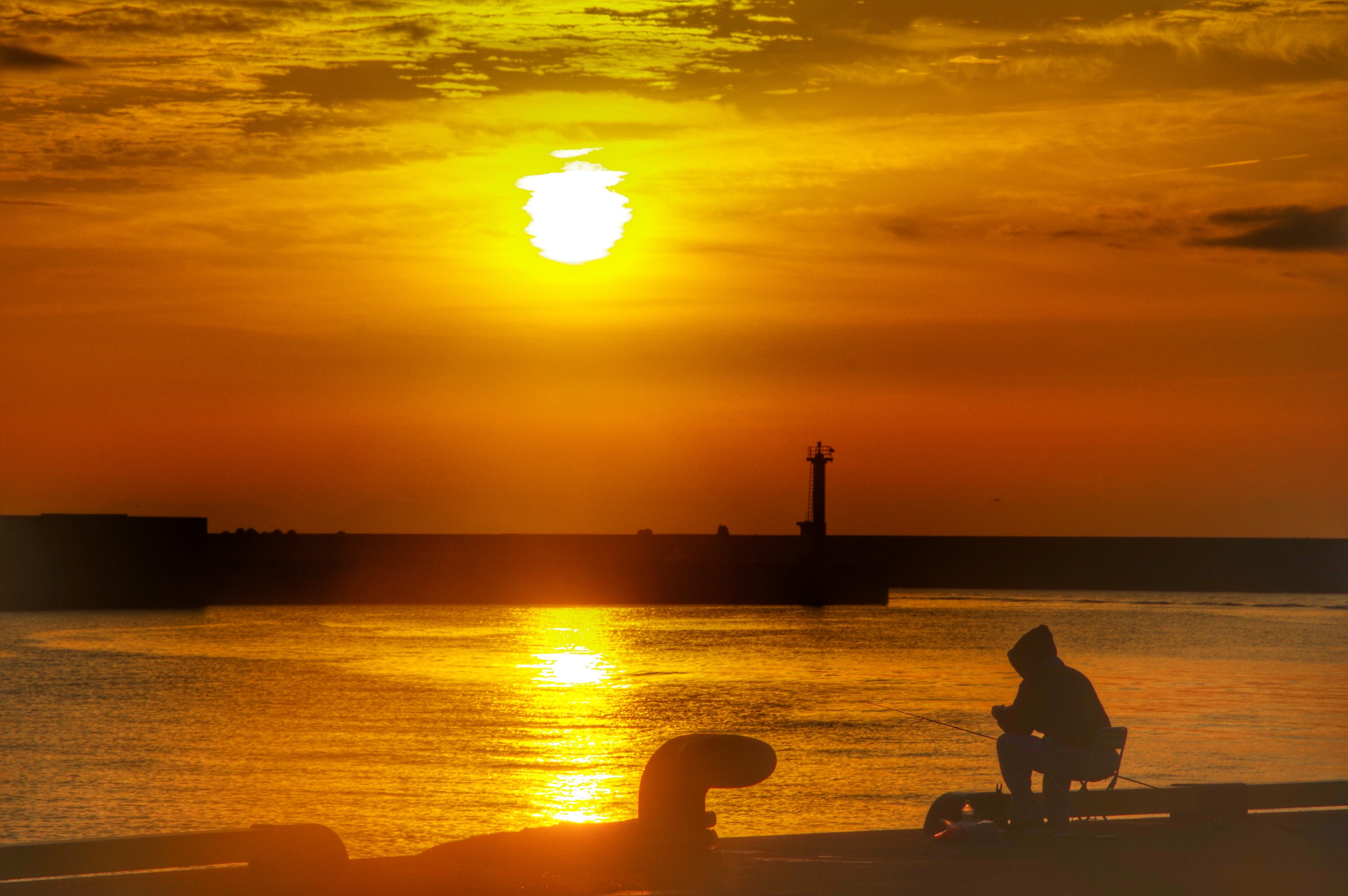 sunlight, silhouette, beauty in nature, sitting, outdoors, cloud - sky, scenics - nature, one person, orange color, sea, sunset, reflection, Sun, japan, HD Wallpaper