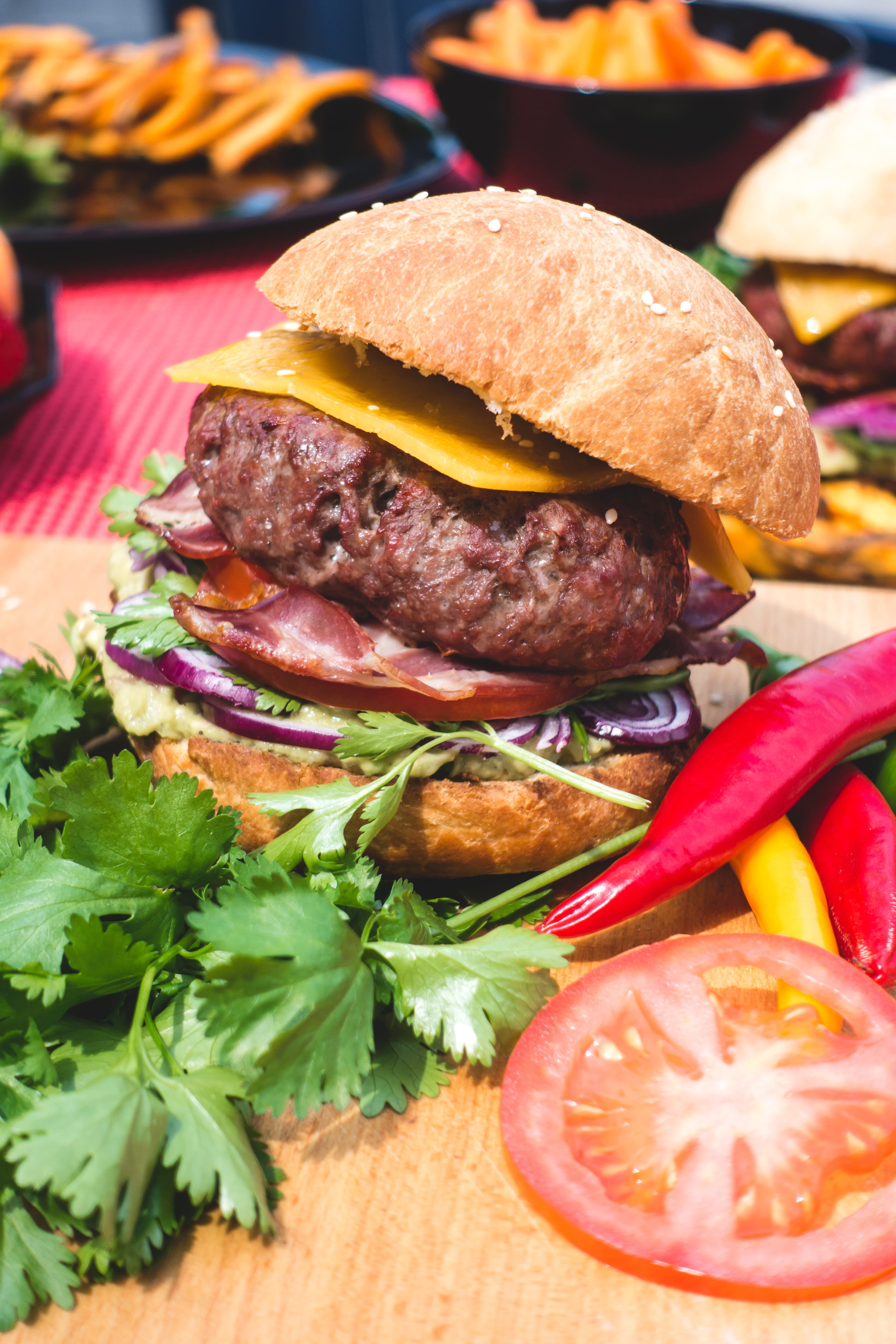 unhealthy Eating, tomato, freshness, grilled, table, outside, meat, sandwich, indoors, french Fries, cheddar, colorful, sesame, bun, cheeseburger, bacon, Phone HD Wallpaper