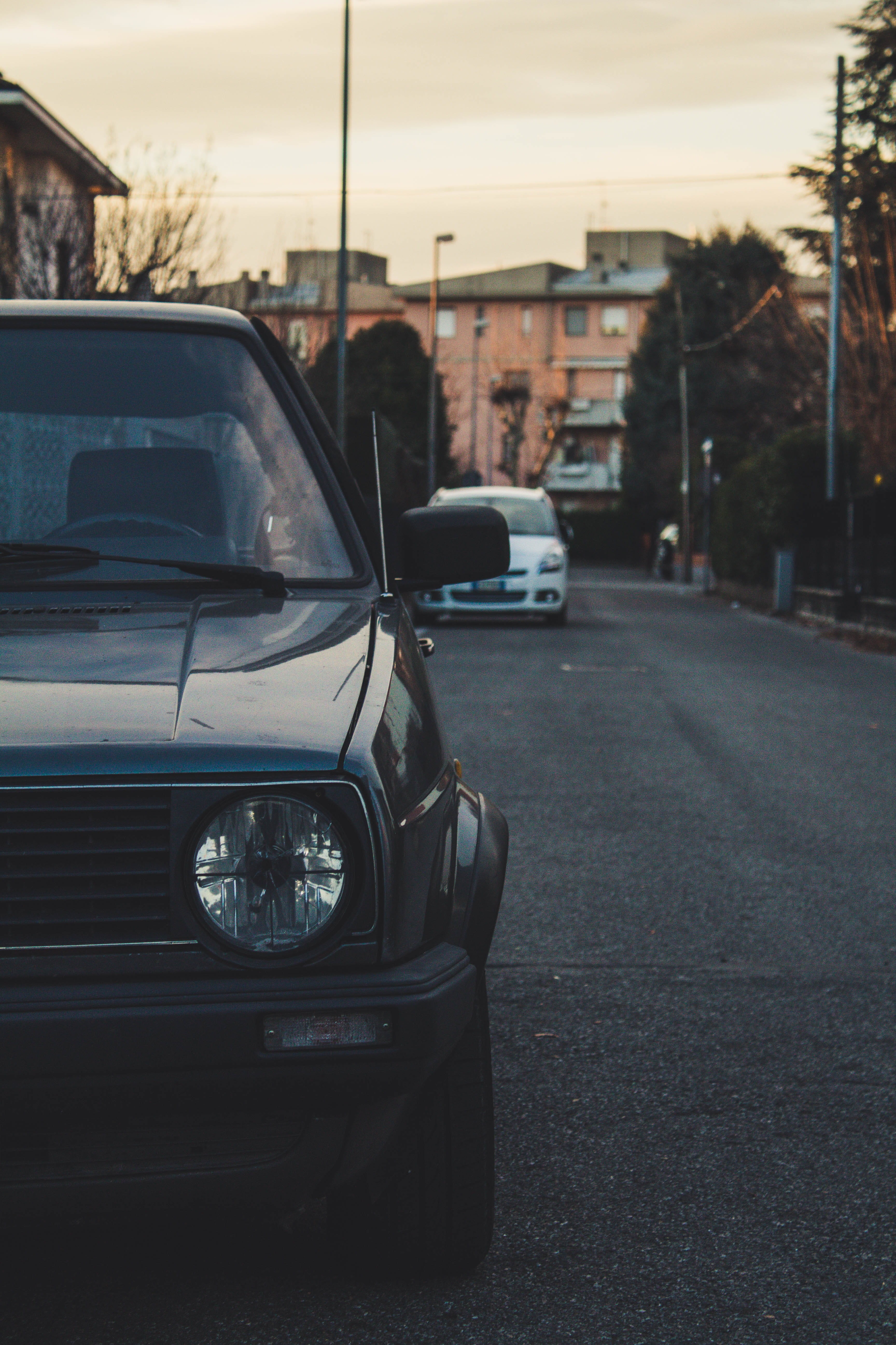 near, asphalt, mode of transportation, headlight, cars, parked, windshield, travel, motor vehicle, beetle, lamppost, 5K, person, vehicle, day, transportation, Phone HD Wallpaper