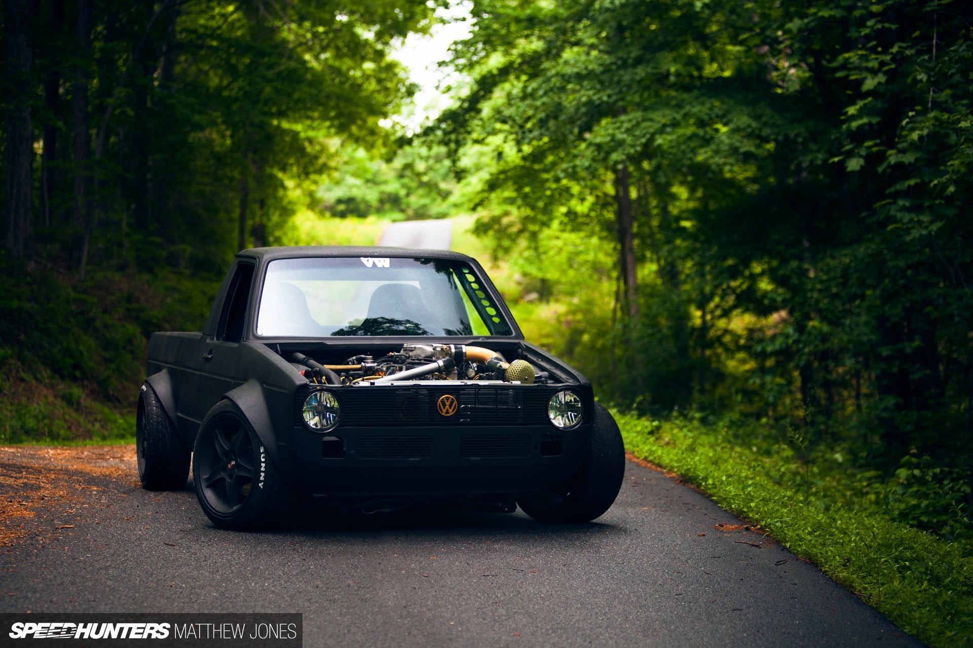 tree, day, forest, rabbit truck, race cars, cab, car, land, nature, land vehicle, road, black, no people, transportation, Volkswagen, mode of transportation, HD Wallpaper