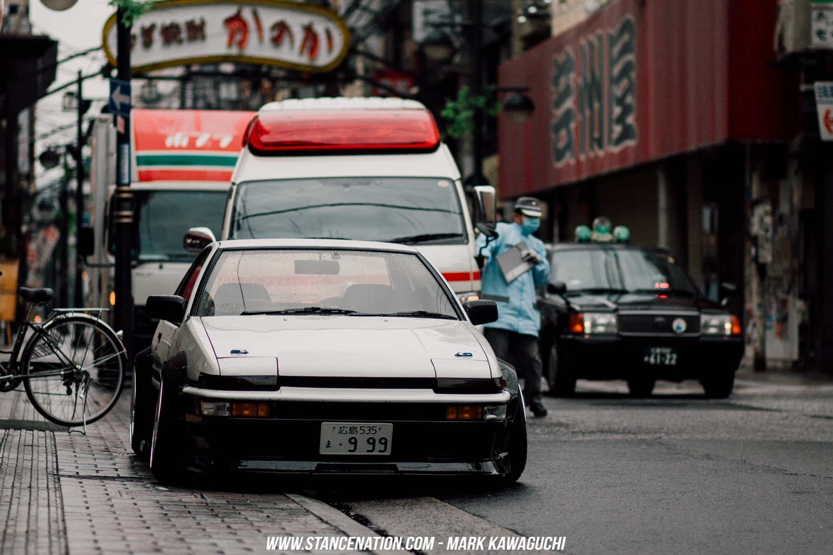 building exterior, city life, incidental people, land vehicle, AE86, road, motor vehicle, traffic, street, day, mode of transportation, city street, car, HD Wallpaper