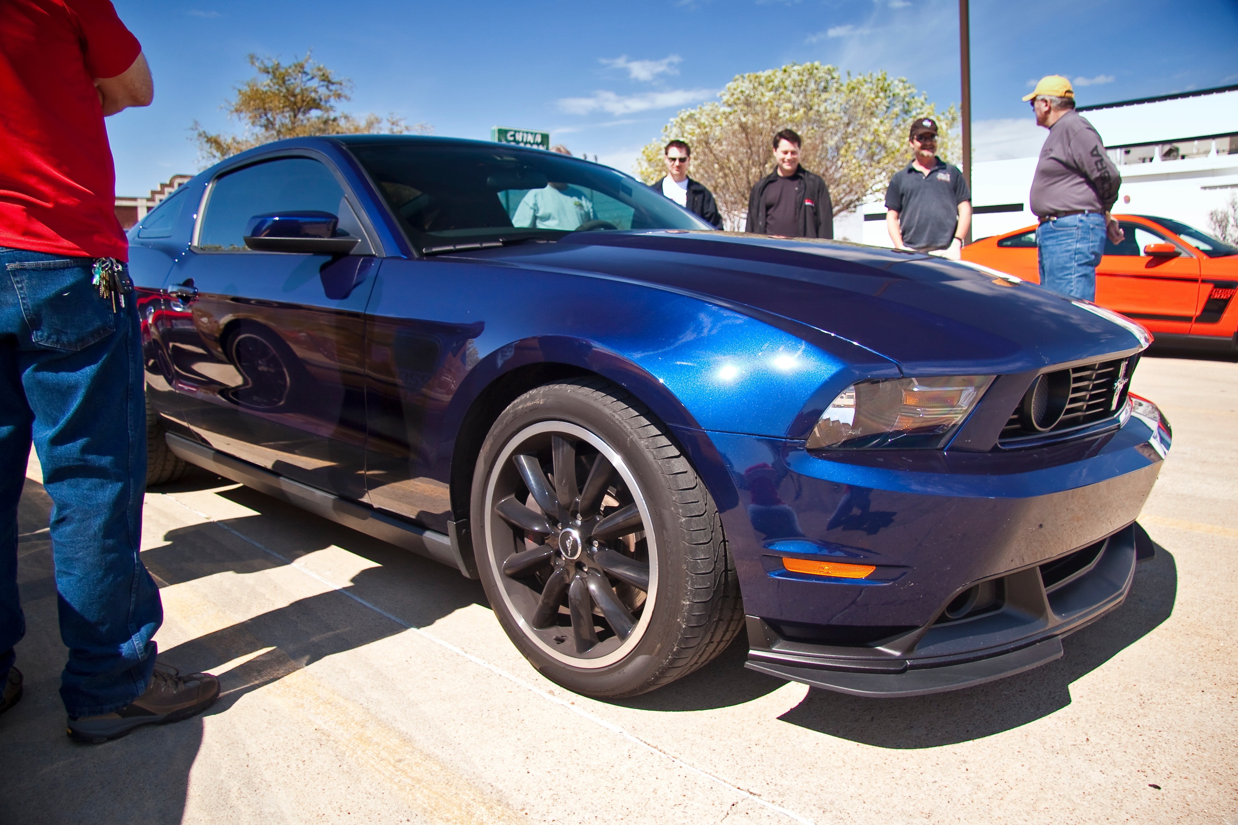 transportation, nature, sunlight, blue, shadow, blue cars, adult, occupation, men, car, standing, vehicle, people, group of people, mustang, ford, casual clothing, HD Wallpaper