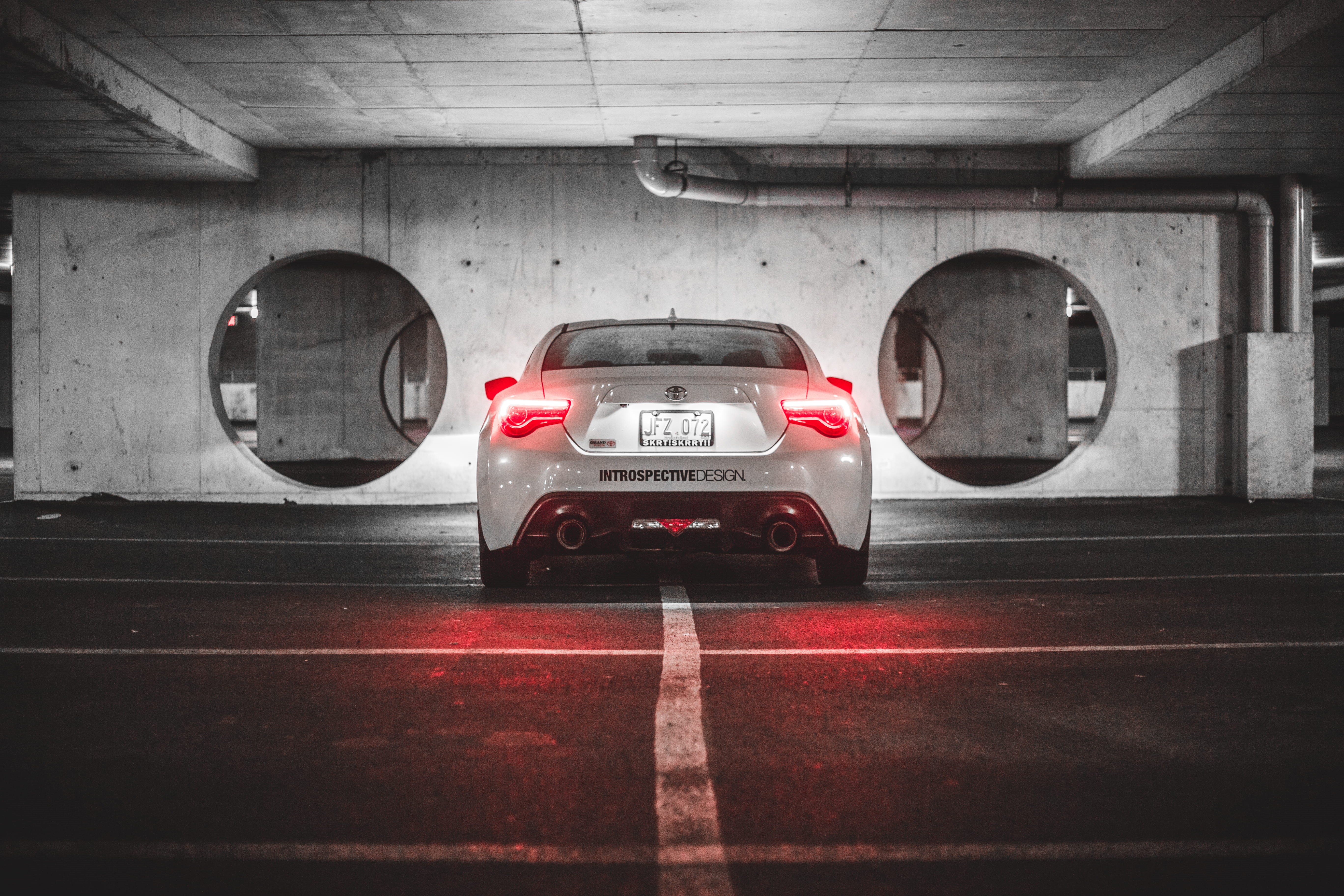 toyota, night, protection, city, red, street, motor vehicle, parking lot, communication, tail lights, sport, wood - material, parking garage, pavement, HD Wallpaper
