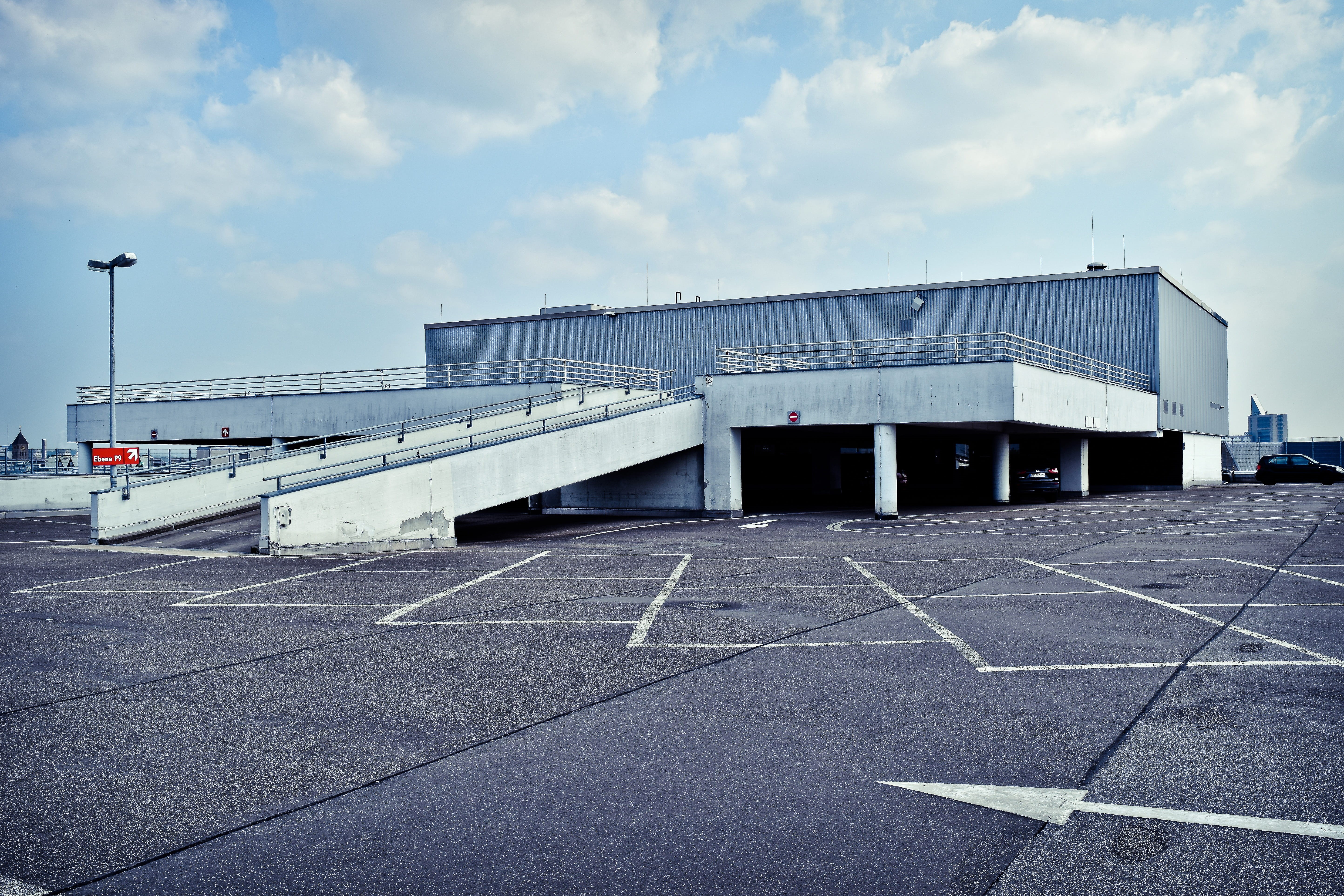 day, airport, alternate space, bleak, built structure, transportation, parking level, architecture, 5K, garage, no people, cloud - sky, mark, flat, park, HD Wallpaper