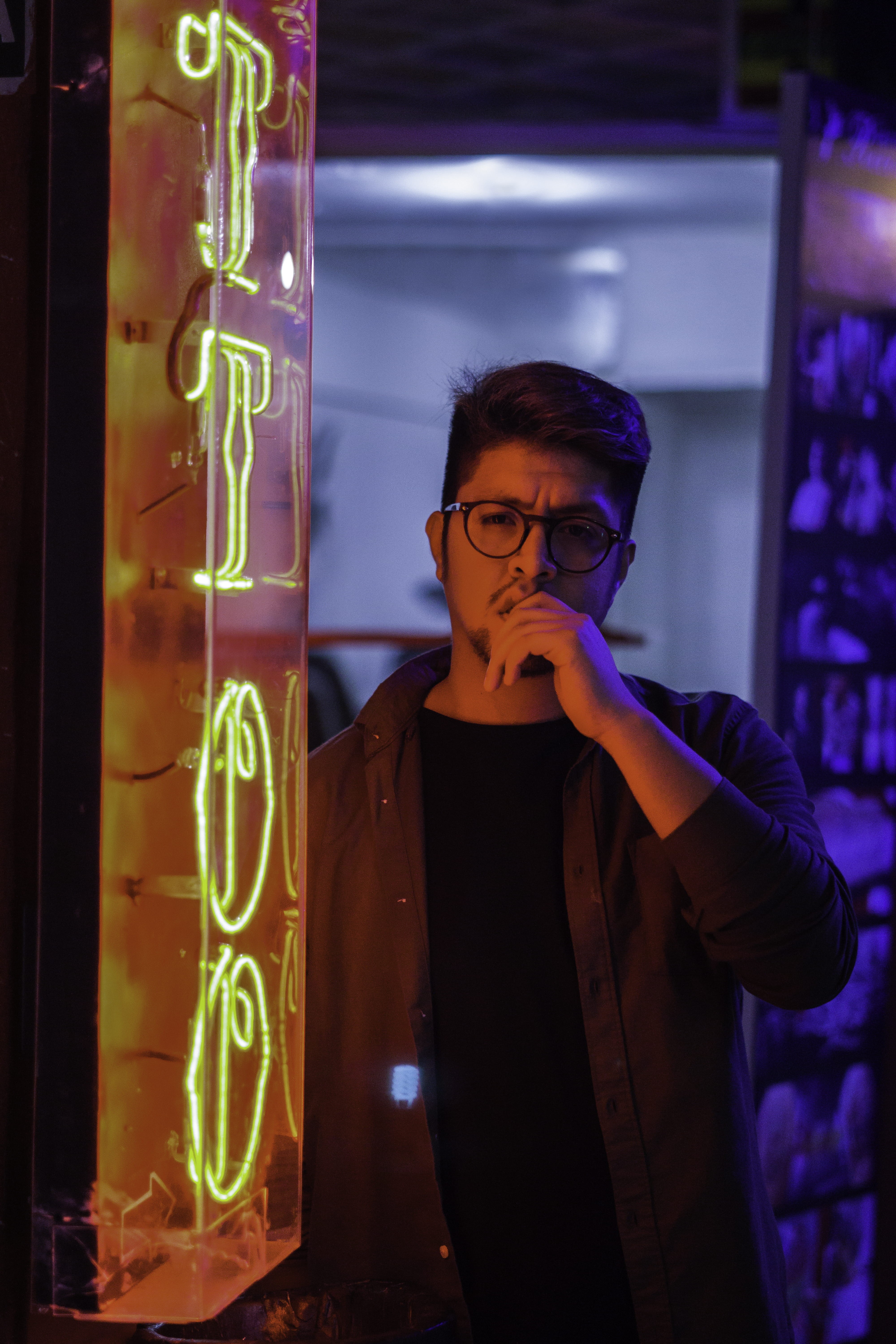 person, yellow, communication, lights, model, casual clothing, man, nightlife, illuminated, signage, portrait, male, one person, lifestyles, beside, waist up, Phone HD Wallpaper