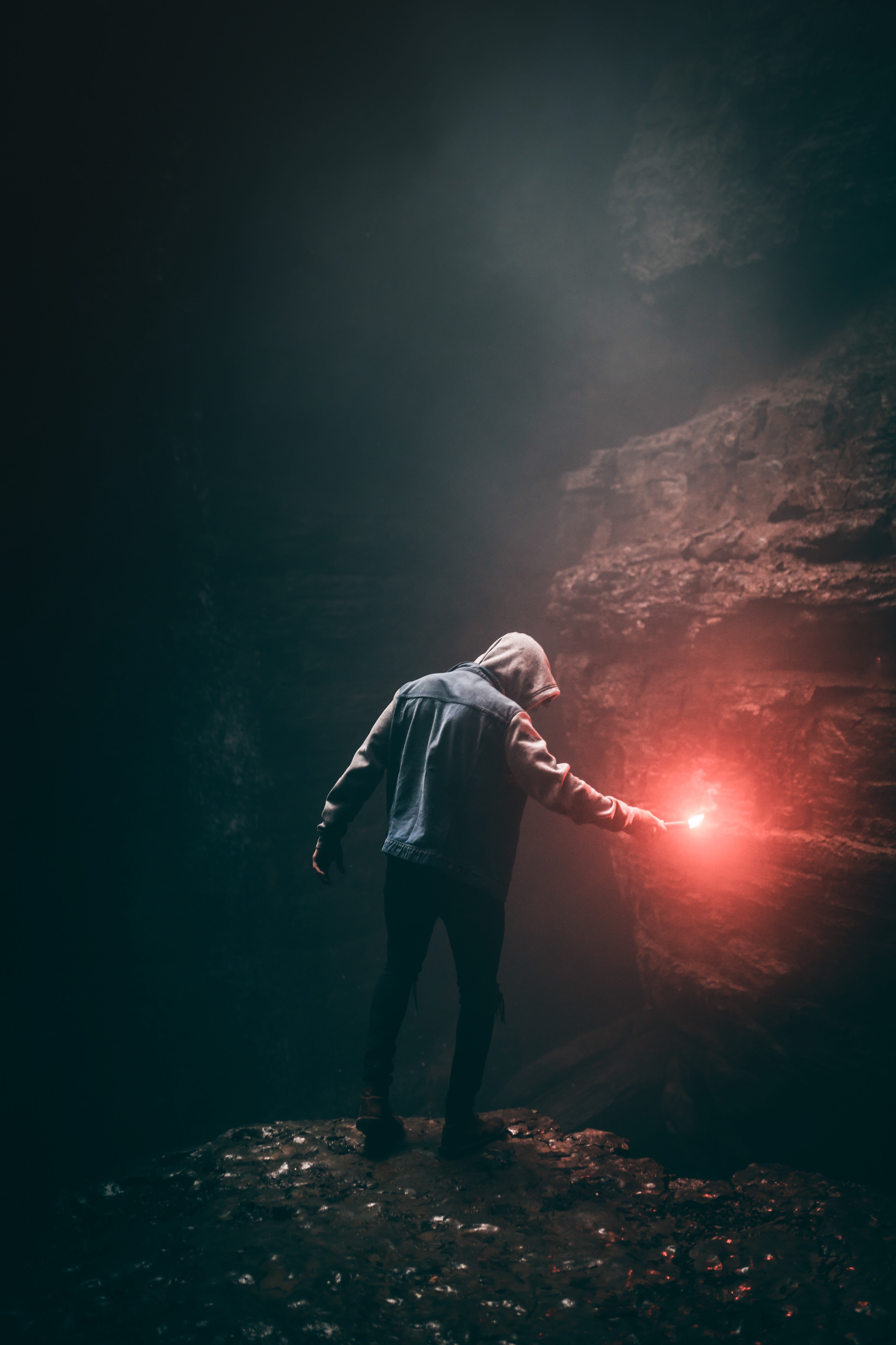 male, mystery, females, flare, model, adventure, silhouette, 5K, women, rock, back Lit, standing, man, night, blue, holding, person, cave, pose, stick, Phone HD Wallpaper