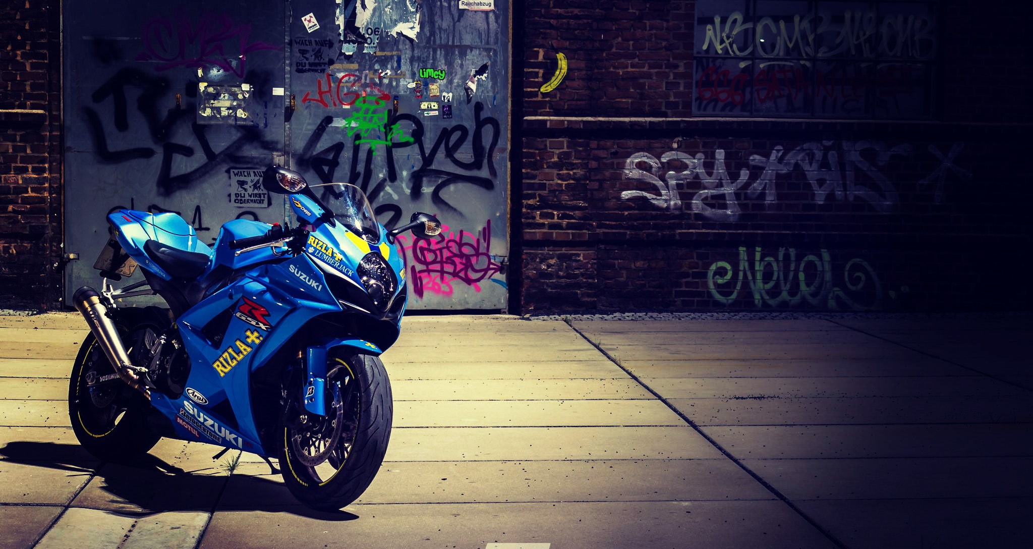 western script, street, footpath, bike, stationary, transportation, building exterior, sportsbike, architecture, no people, city, sidewalk, graffiti, scooter, HD Wallpaper