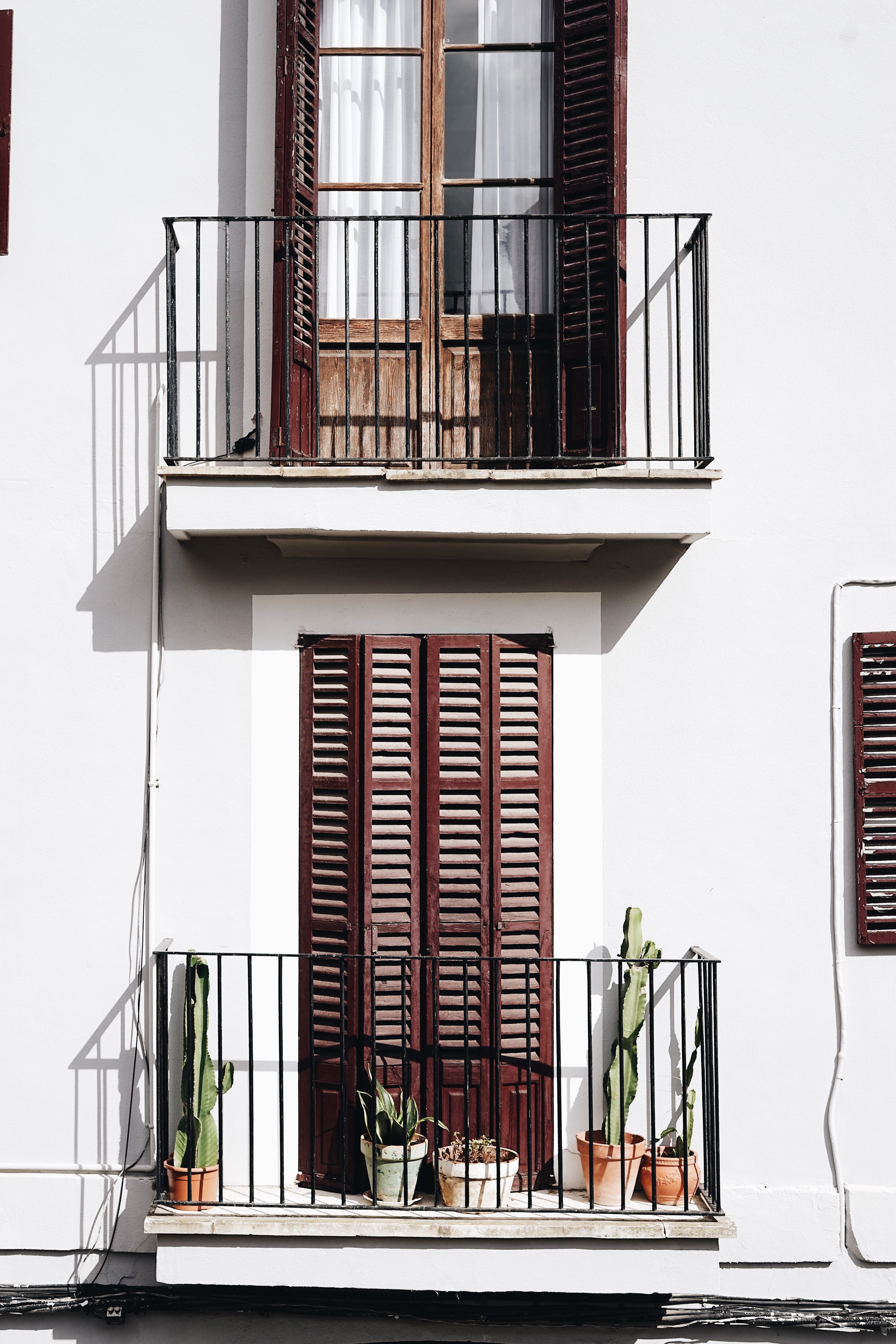 building, plants, wall, outdoors, built structure, near, balcony, house, door, nature, white color, glass - material, brown, building exterior, dor, railing, Phone HD Wallpaper