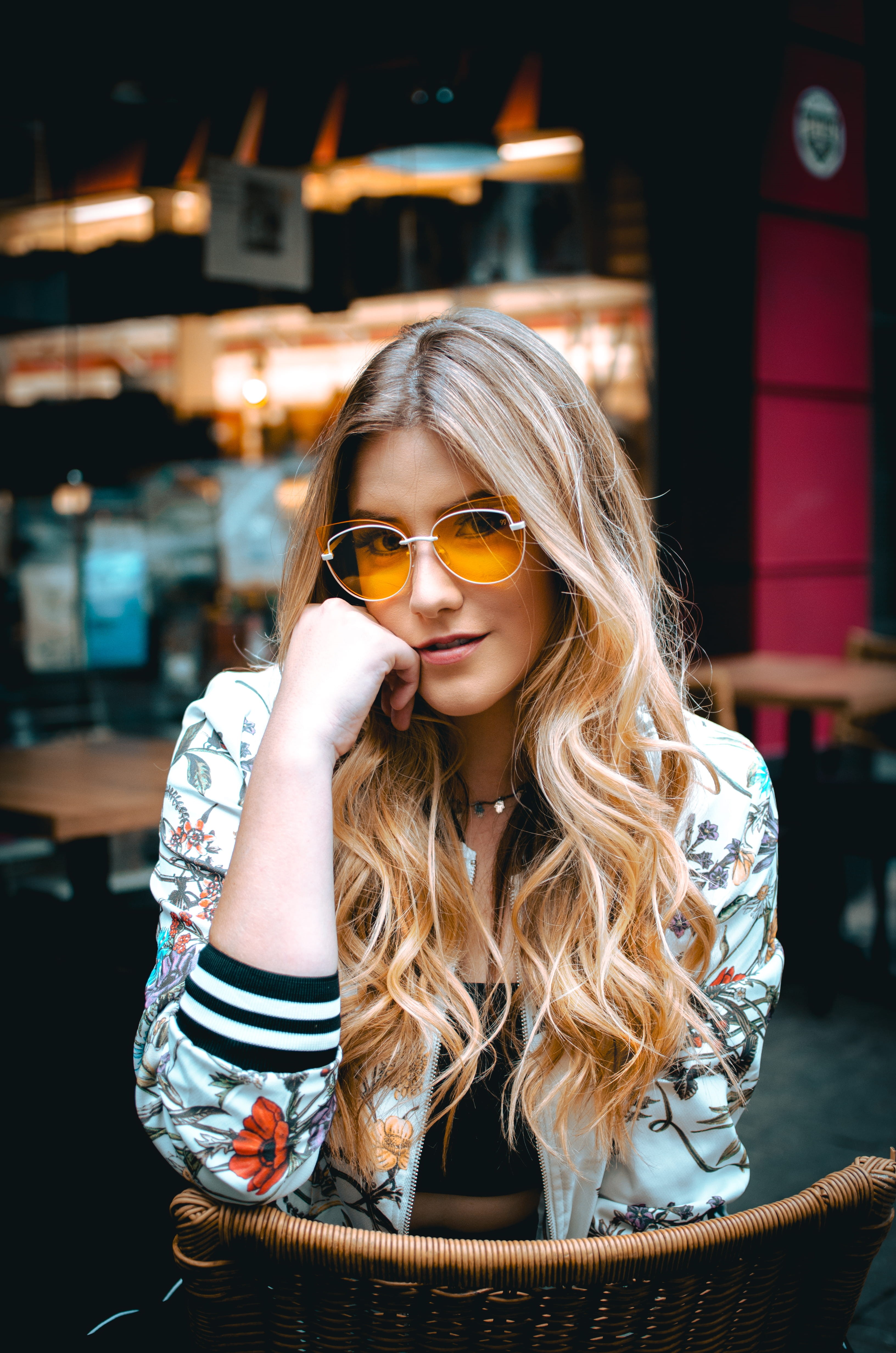 mood, 4K, face, front view, building, architecture, lifestyles, blonde hair, holding, sitting, women, female, hair, moody, long hair, three quarter length, Phone HD Wallpaper