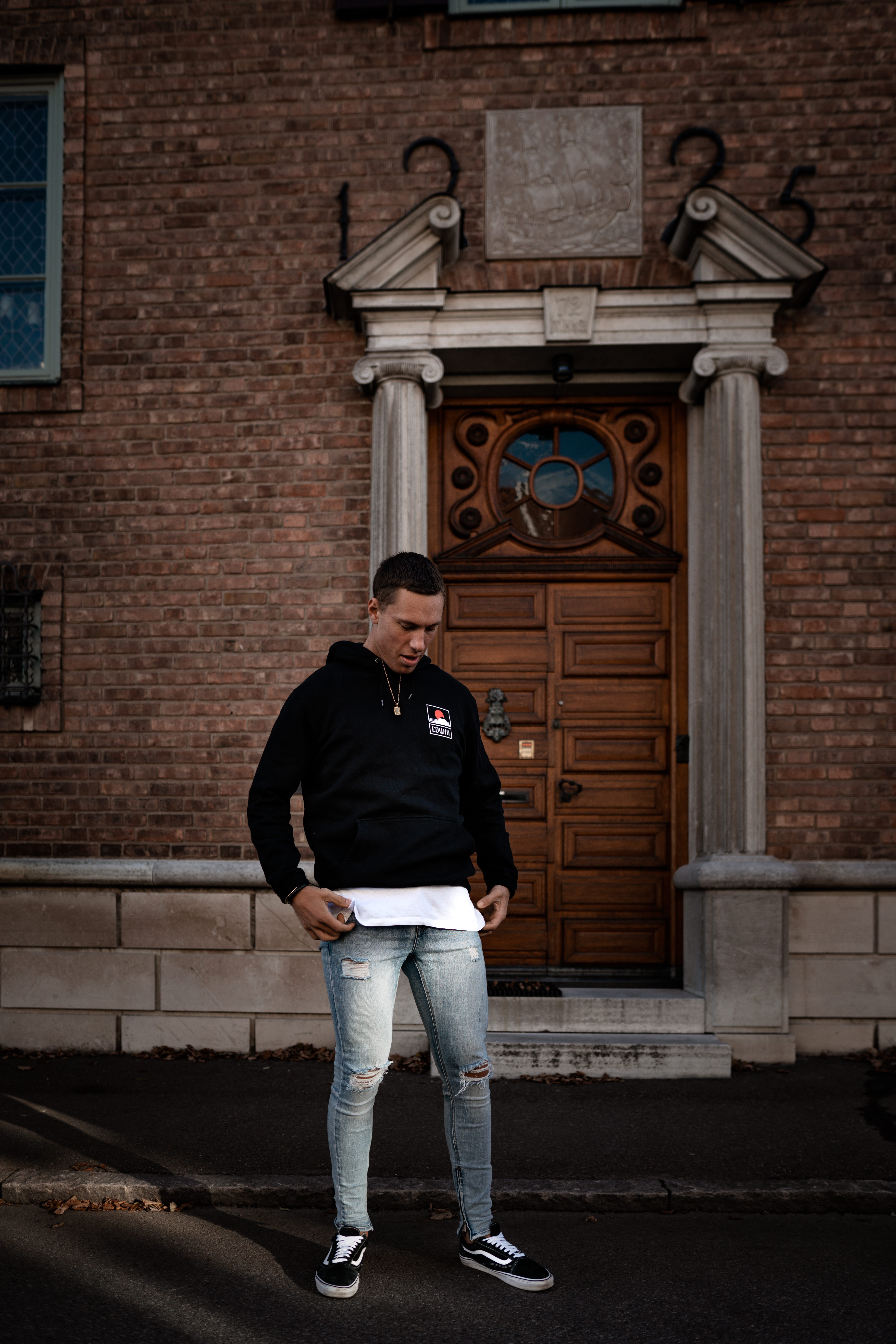lifestyles, person, building exterior, human, young men, day, hands in pockets, young adult, standing, 8K, architecture, front view, shoe, leisure activity, Phone HD Wallpaper